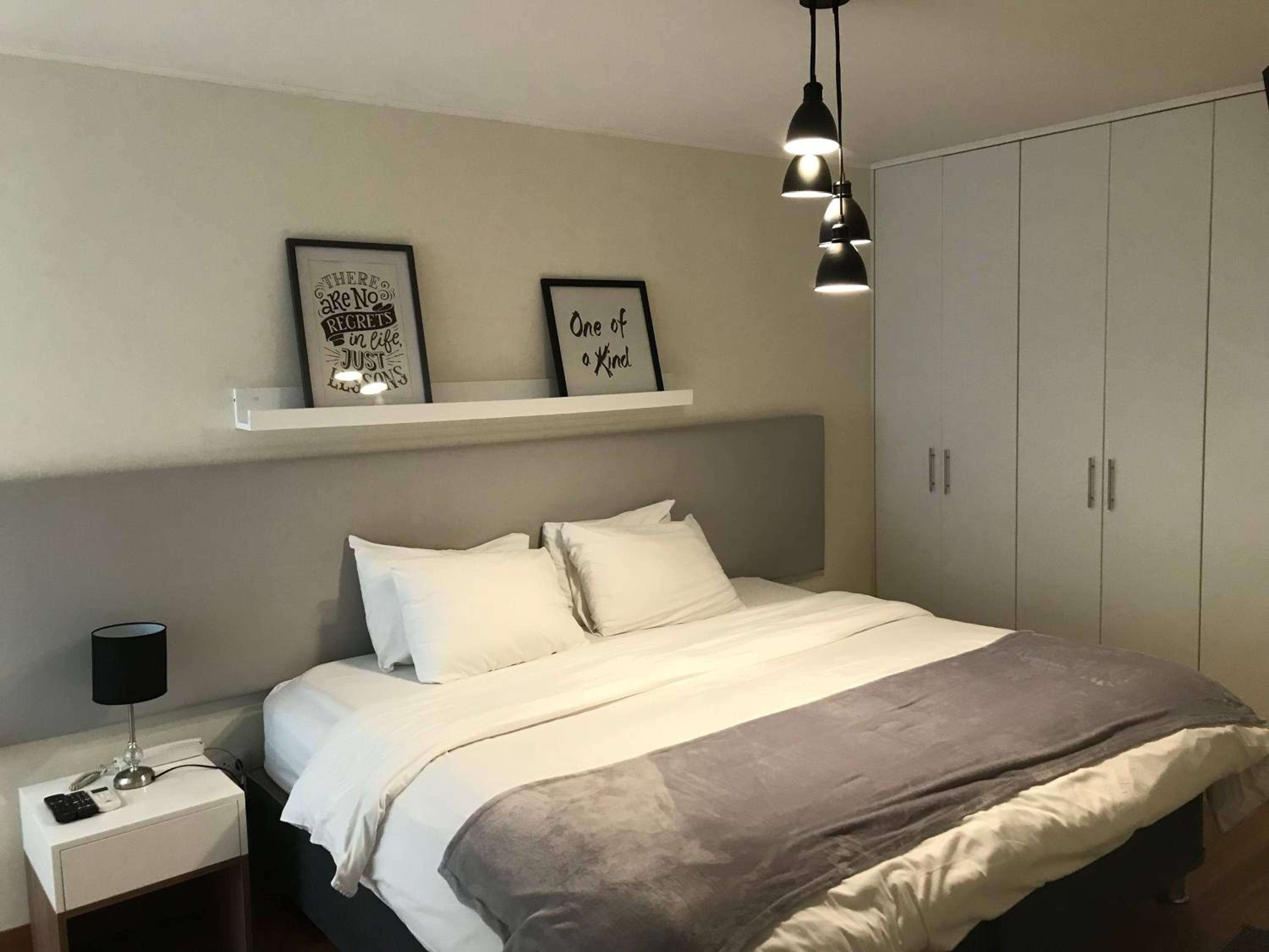 Three-Bedroom Apartment photo 1