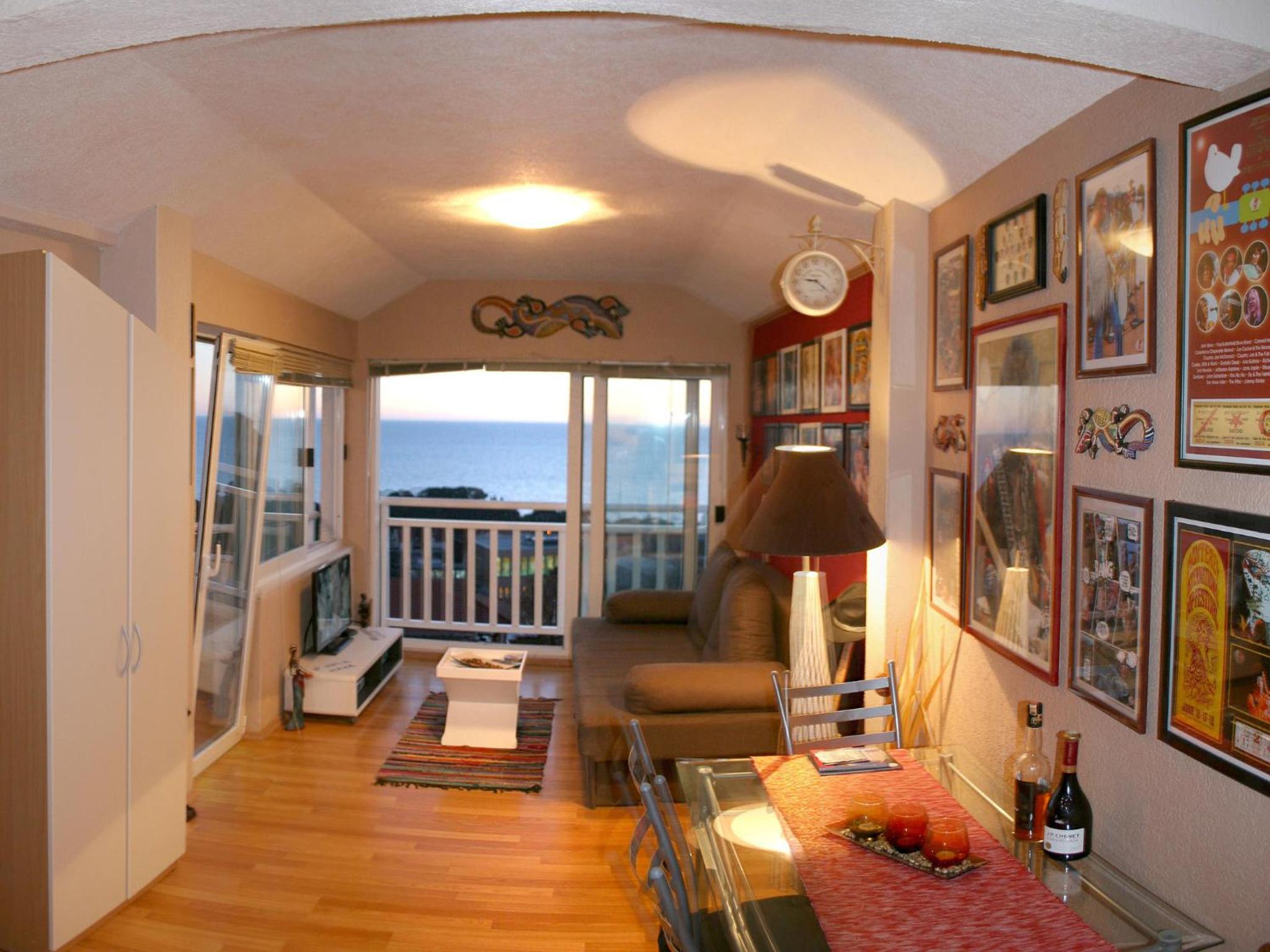 One-Bedroom Apartment with Balcony and Sea View