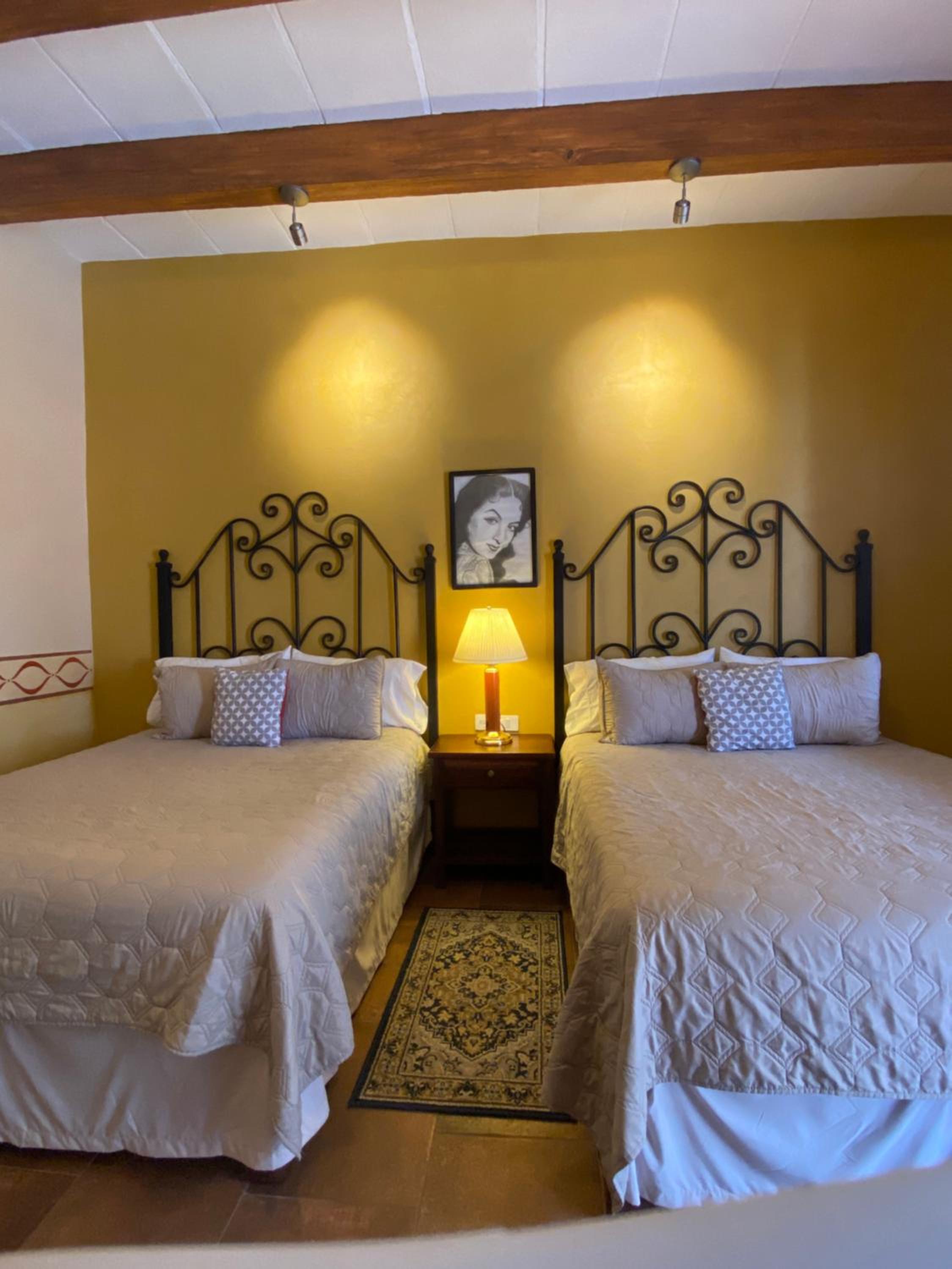 Queen Room with Two Queen Beds - Photo 1