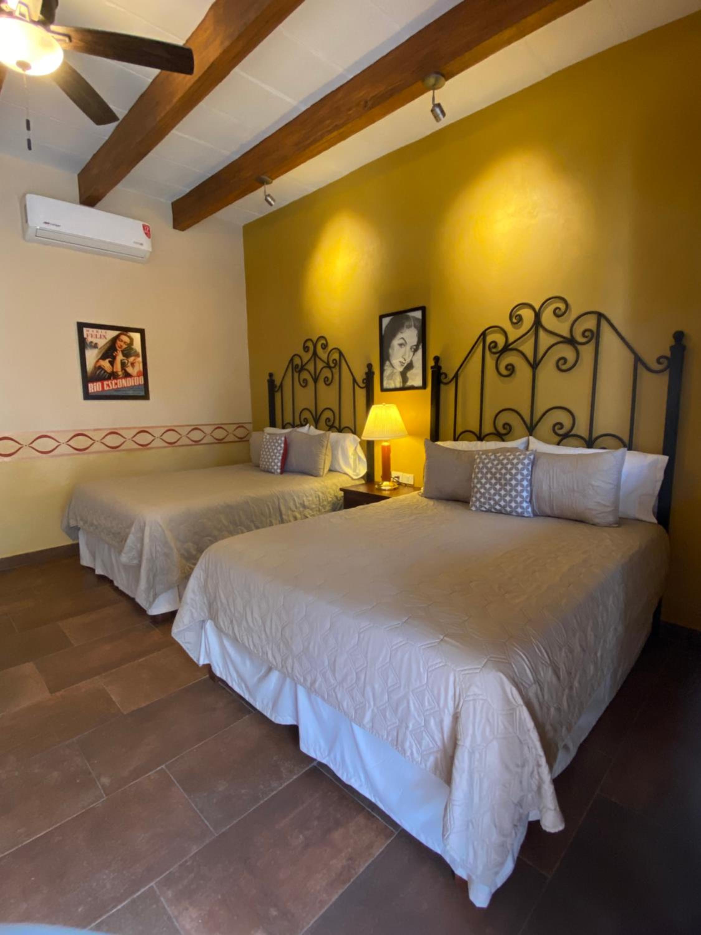 Queen Room with Two Queen Beds - Photo 2