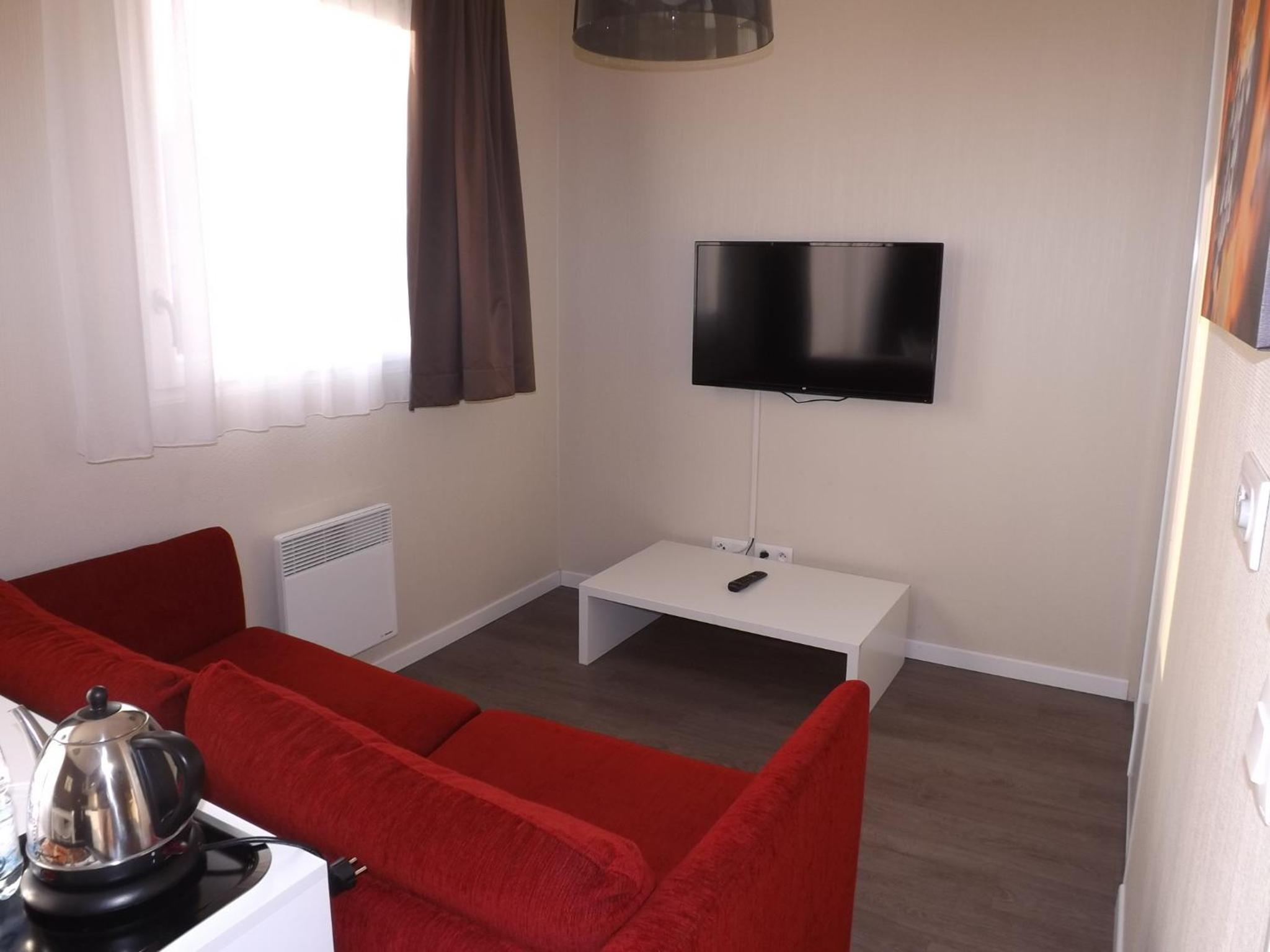 One-Bedroom Apartment (2 Adults + 2 Children) - Photo 2