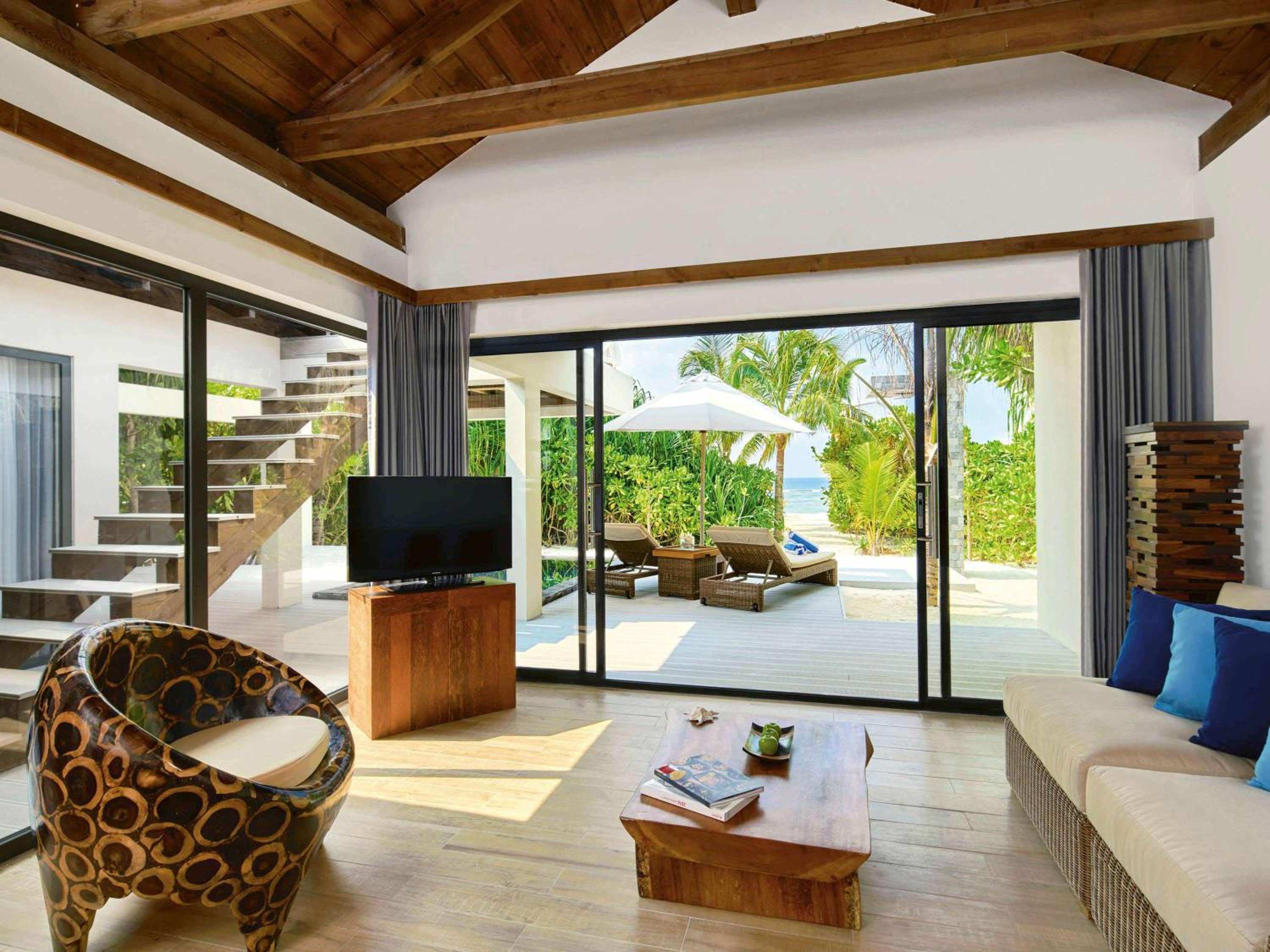 Beach Pool Villa Sunset, Living space, Sunbed & Swing, daily free flow chocolate hour, free snorkeling gear & non-motorized water sports
