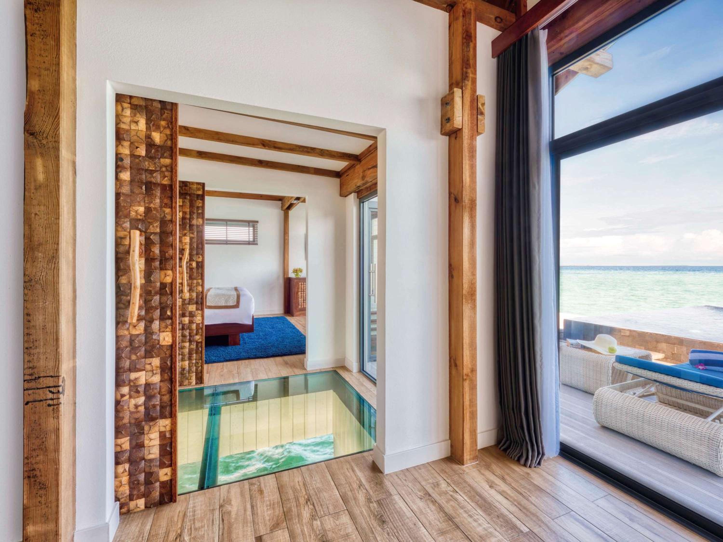 Overwater Pool Villa Lagoon, see-through floor, infinity pool, daily free flow chocolate hour, free snorkeling gear & non-motorized water sports