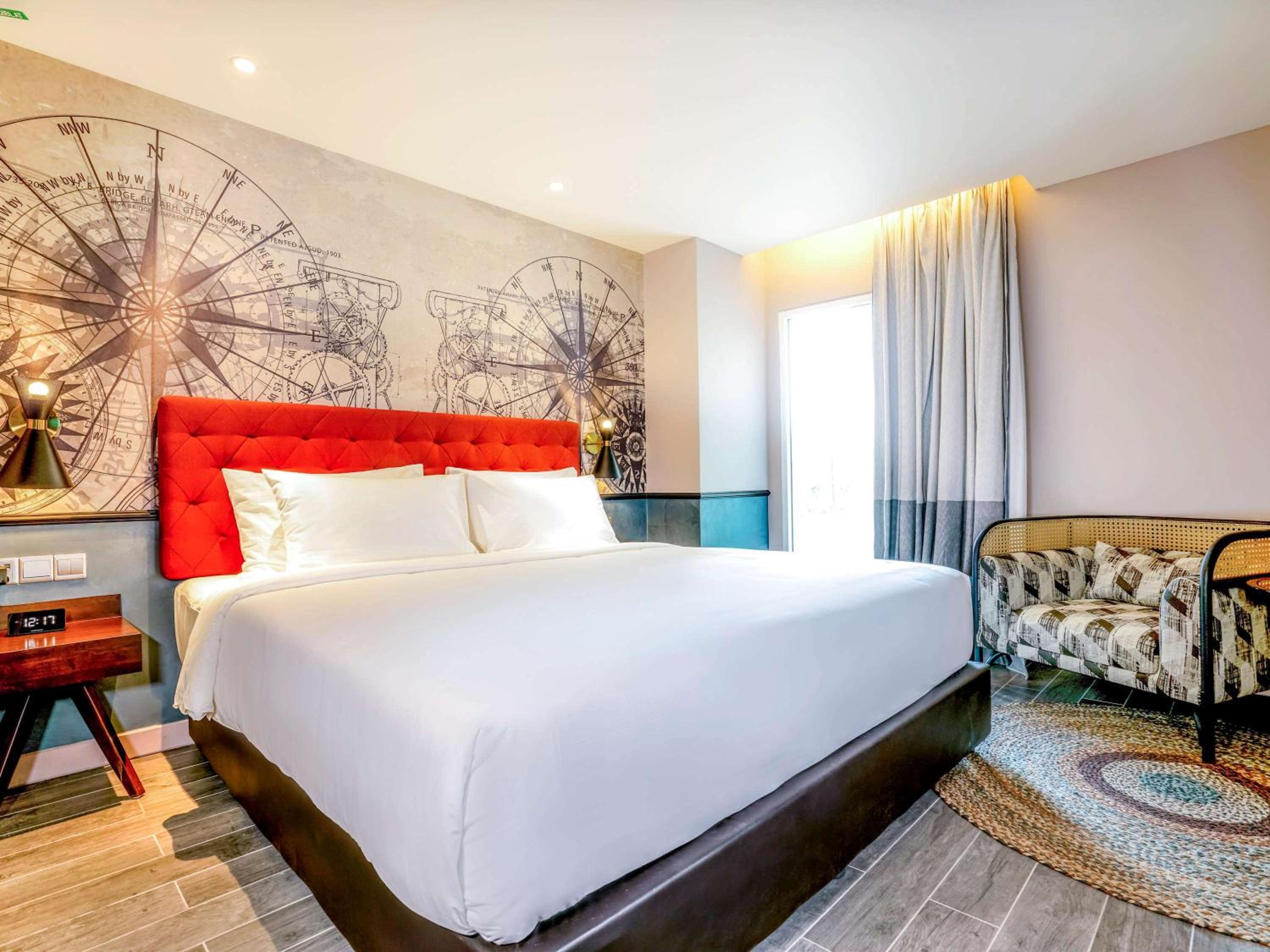 Deluxe Room with One Double and One Single Bed - Photo 1