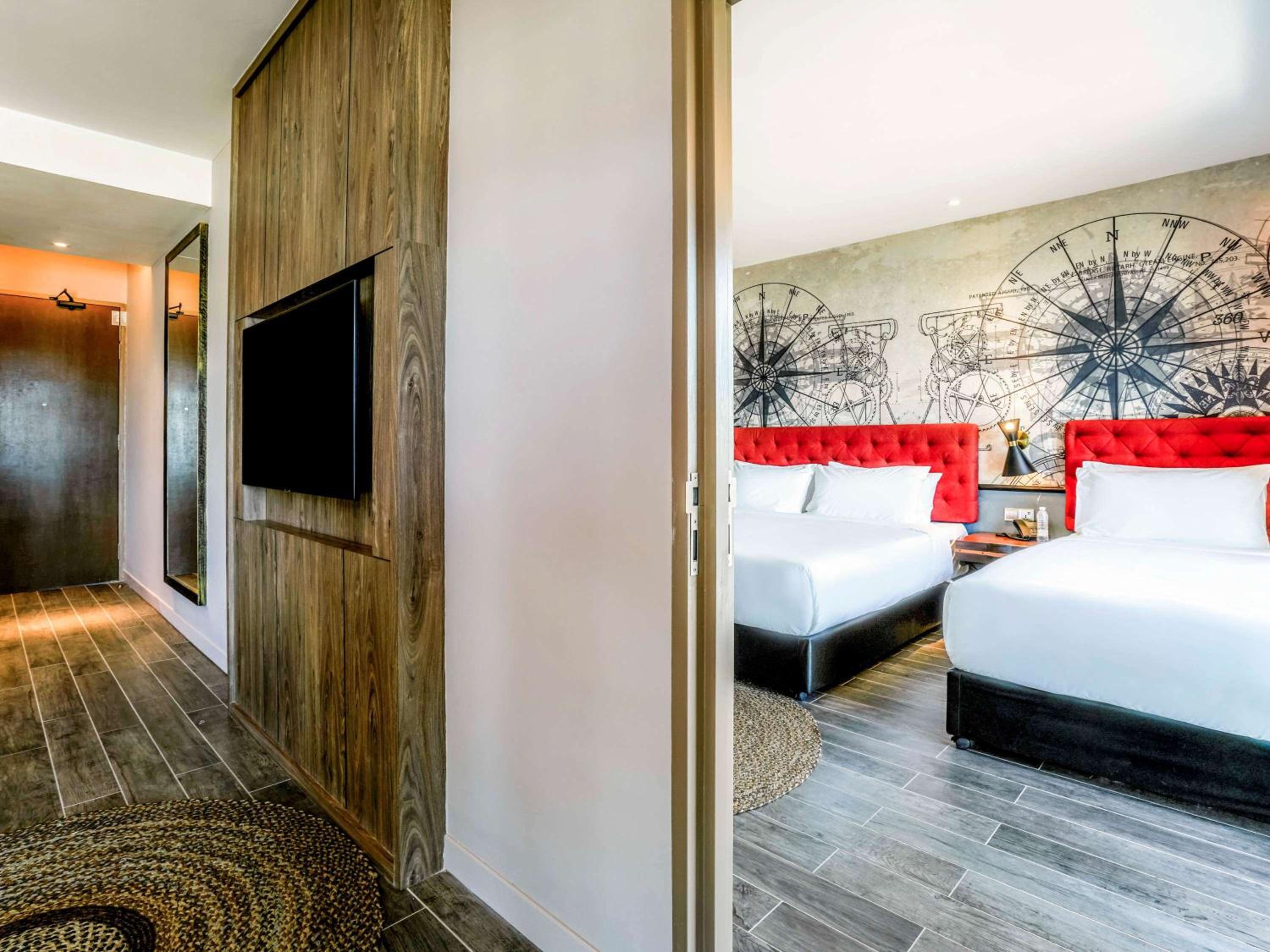 Deluxe Room with One Double and One Single Bed - Photo 4