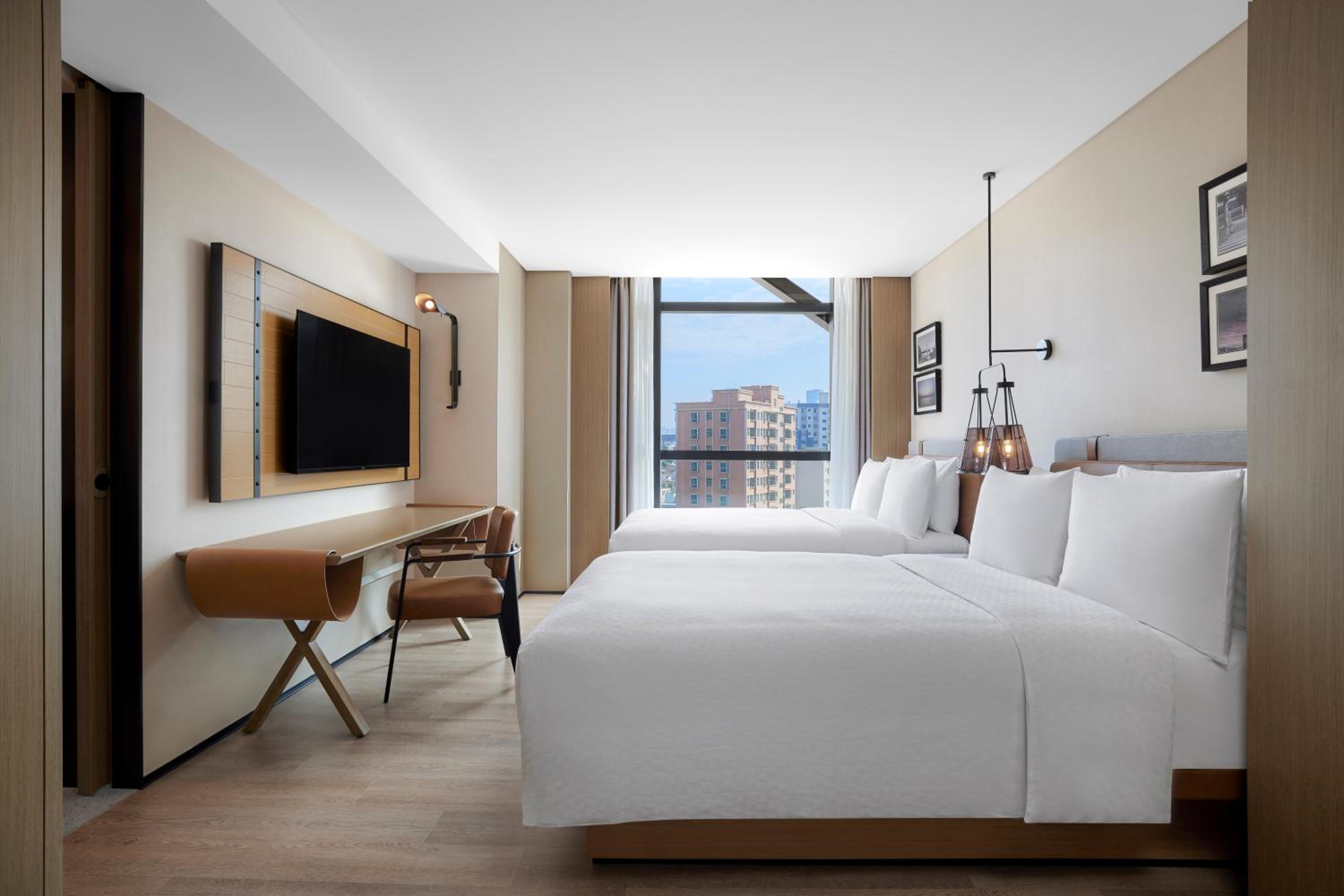 Deluxe Double Room with Two Double Beds and City View - Photo 1