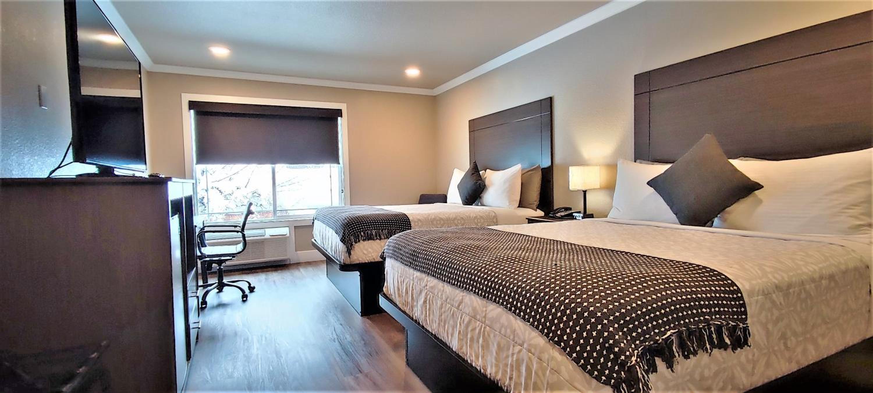Superior Queen Room with Two Queen Beds - Photo 1
