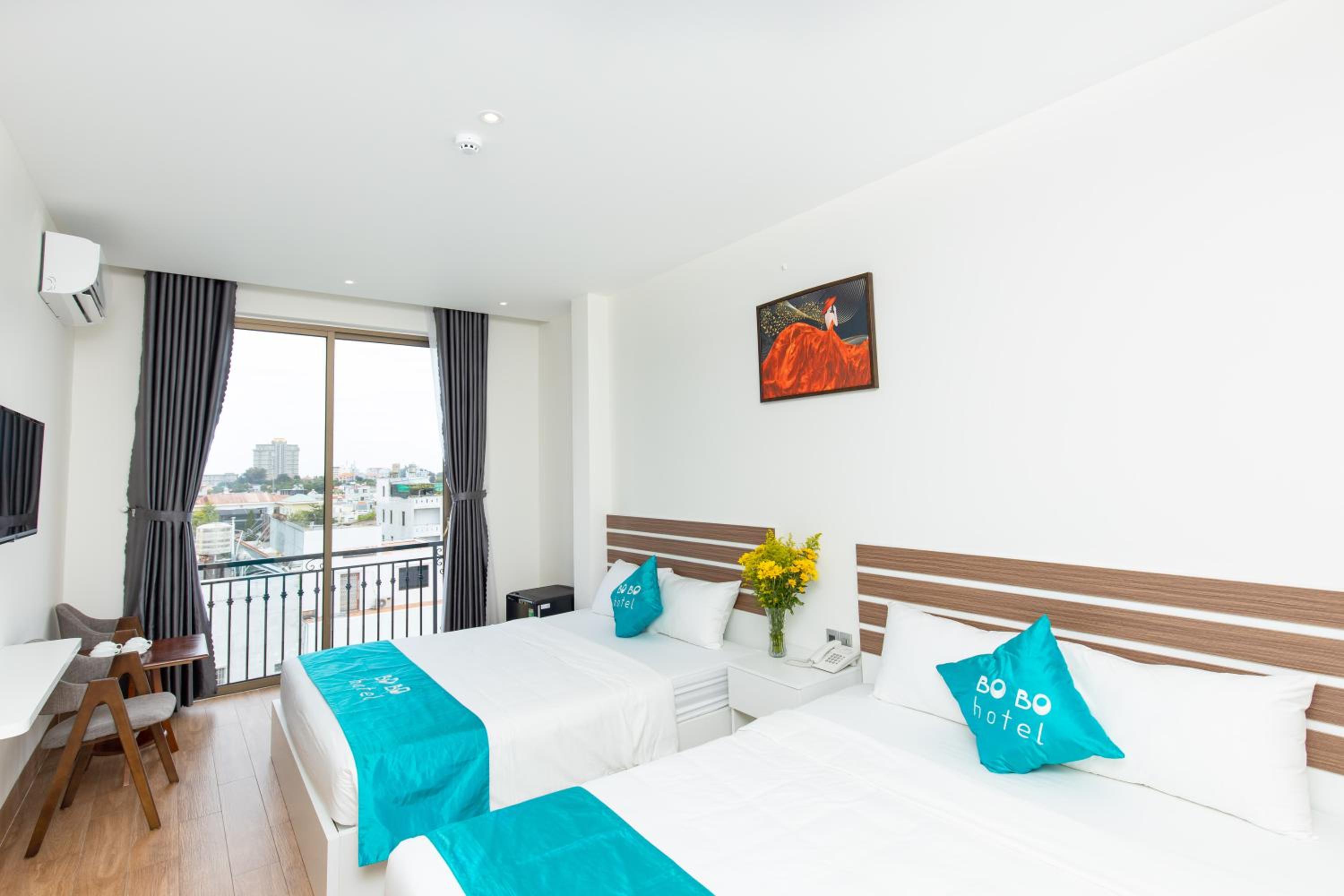  Deluxe Triple Room with Balcony - Photo 10