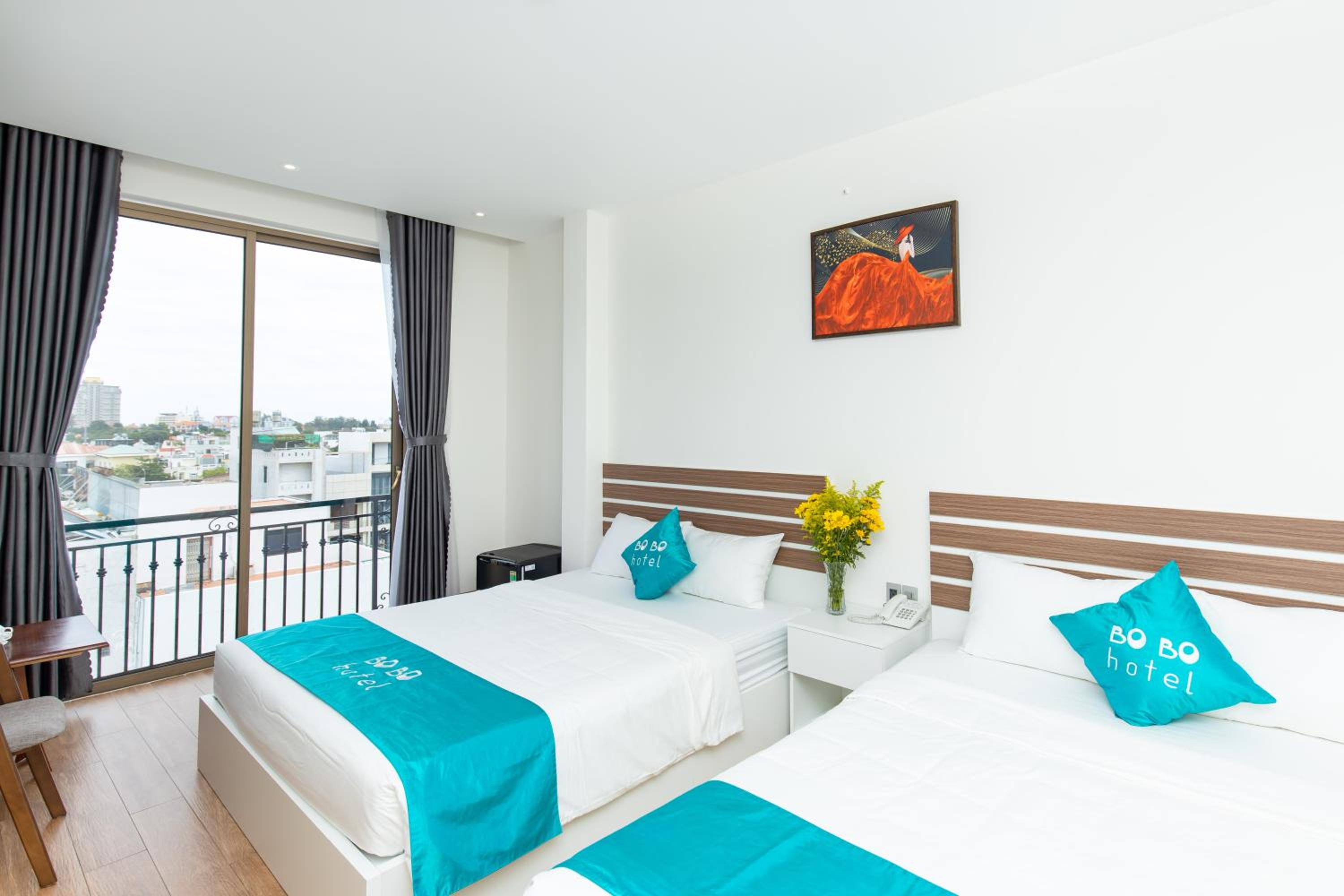  Deluxe Triple Room with Balcony - Photo 9