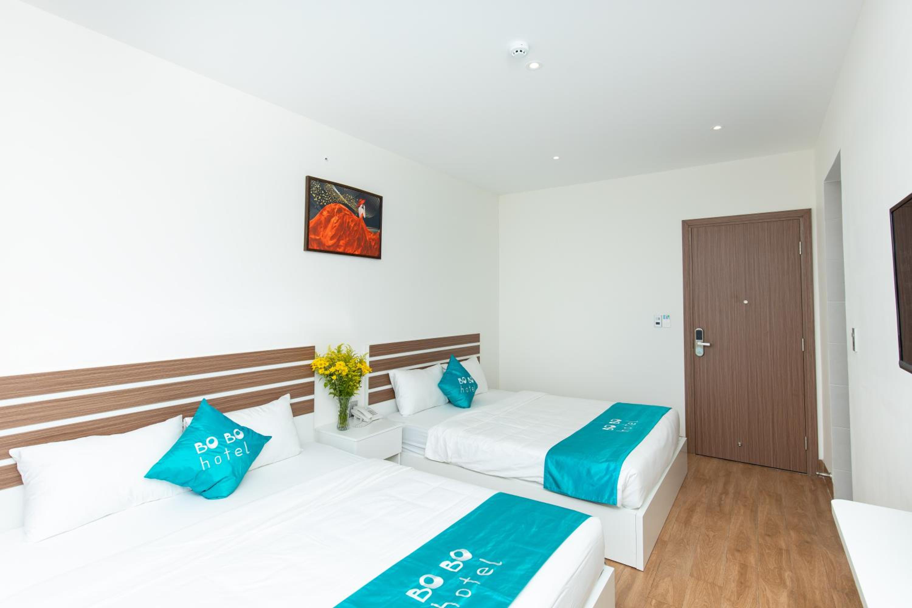  Deluxe Triple Room with Balcony - Photo 8