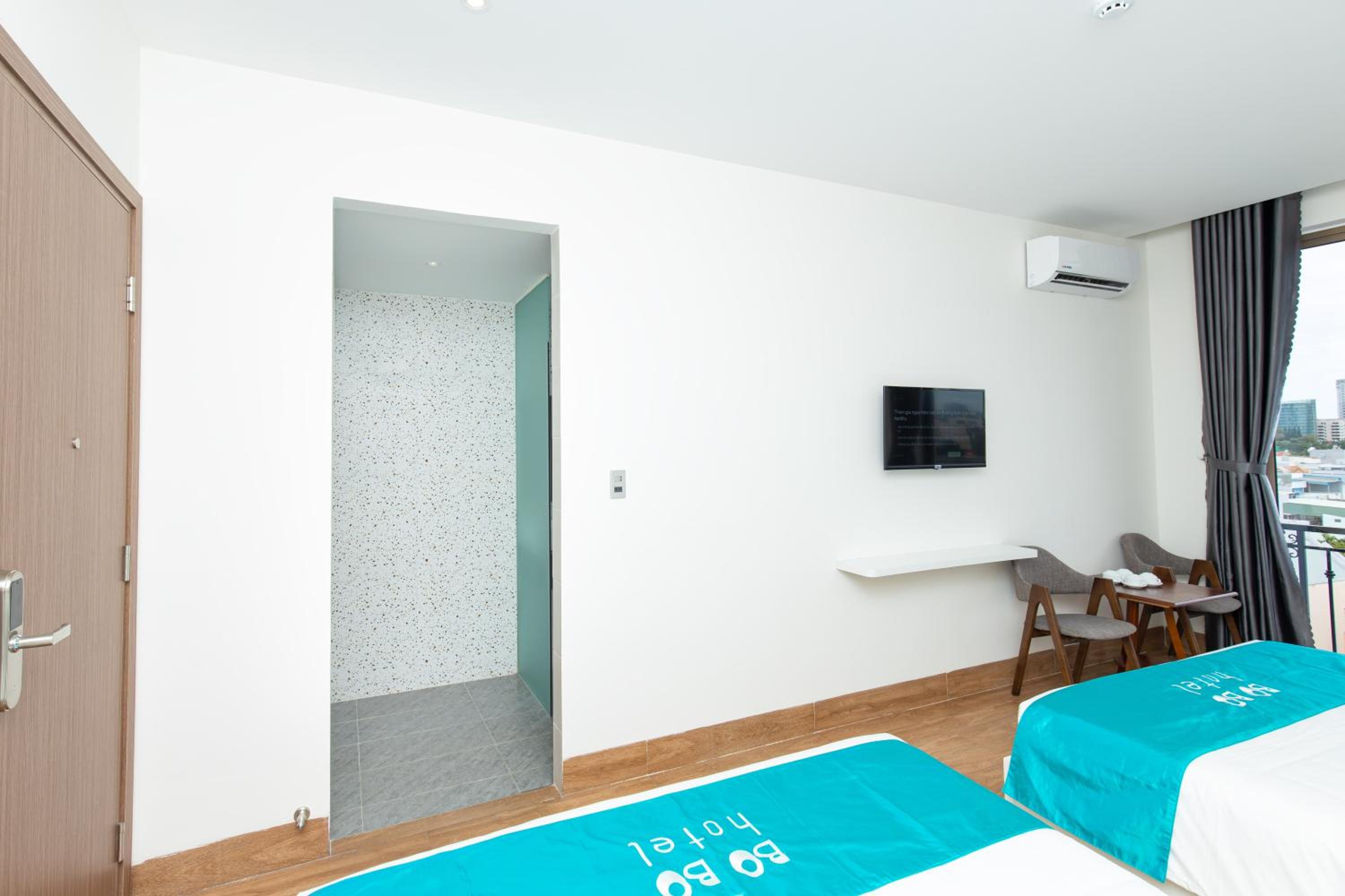  Deluxe Triple Room with Balcony - Photo 11