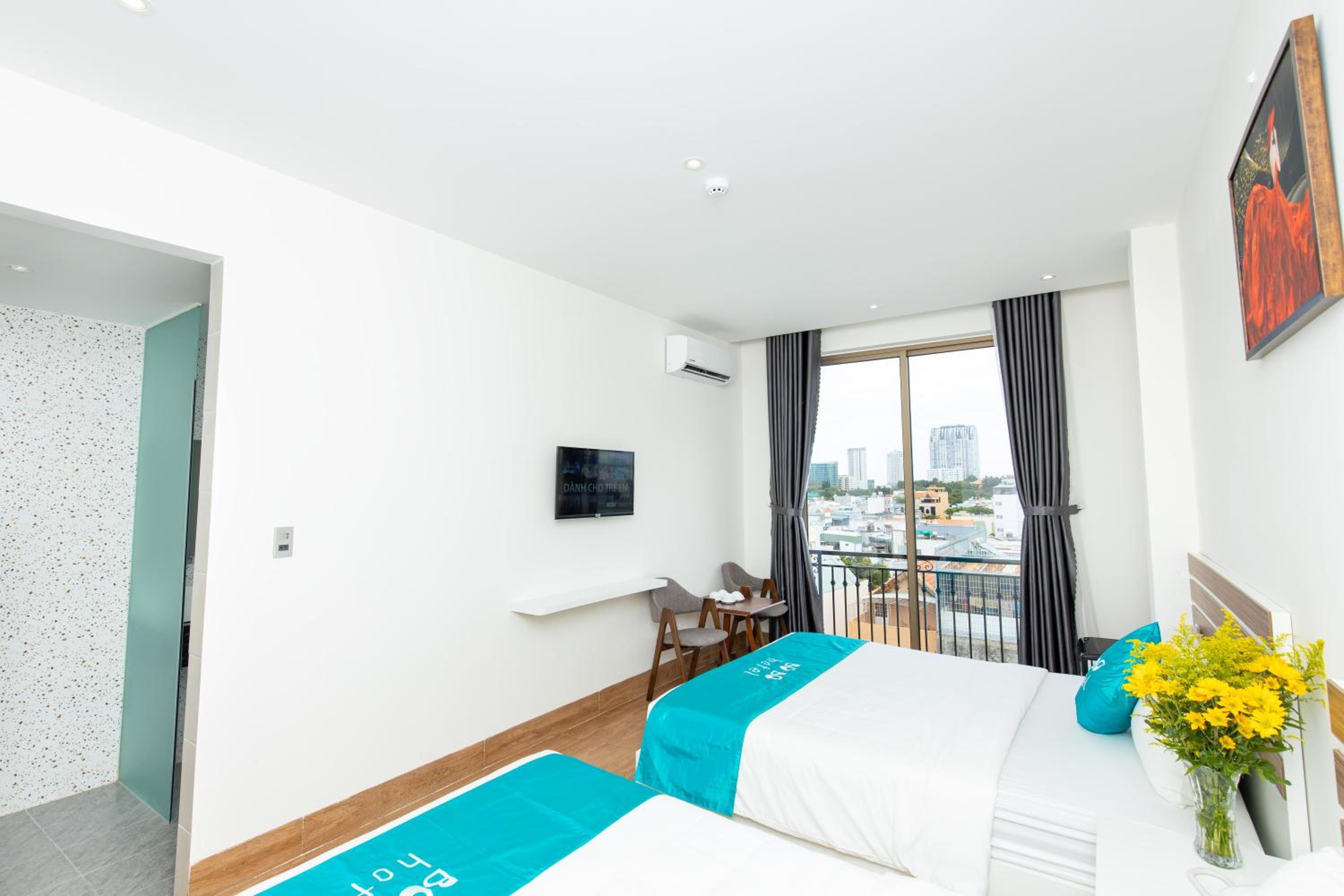  Deluxe Triple Room with Balcony - Photo 6