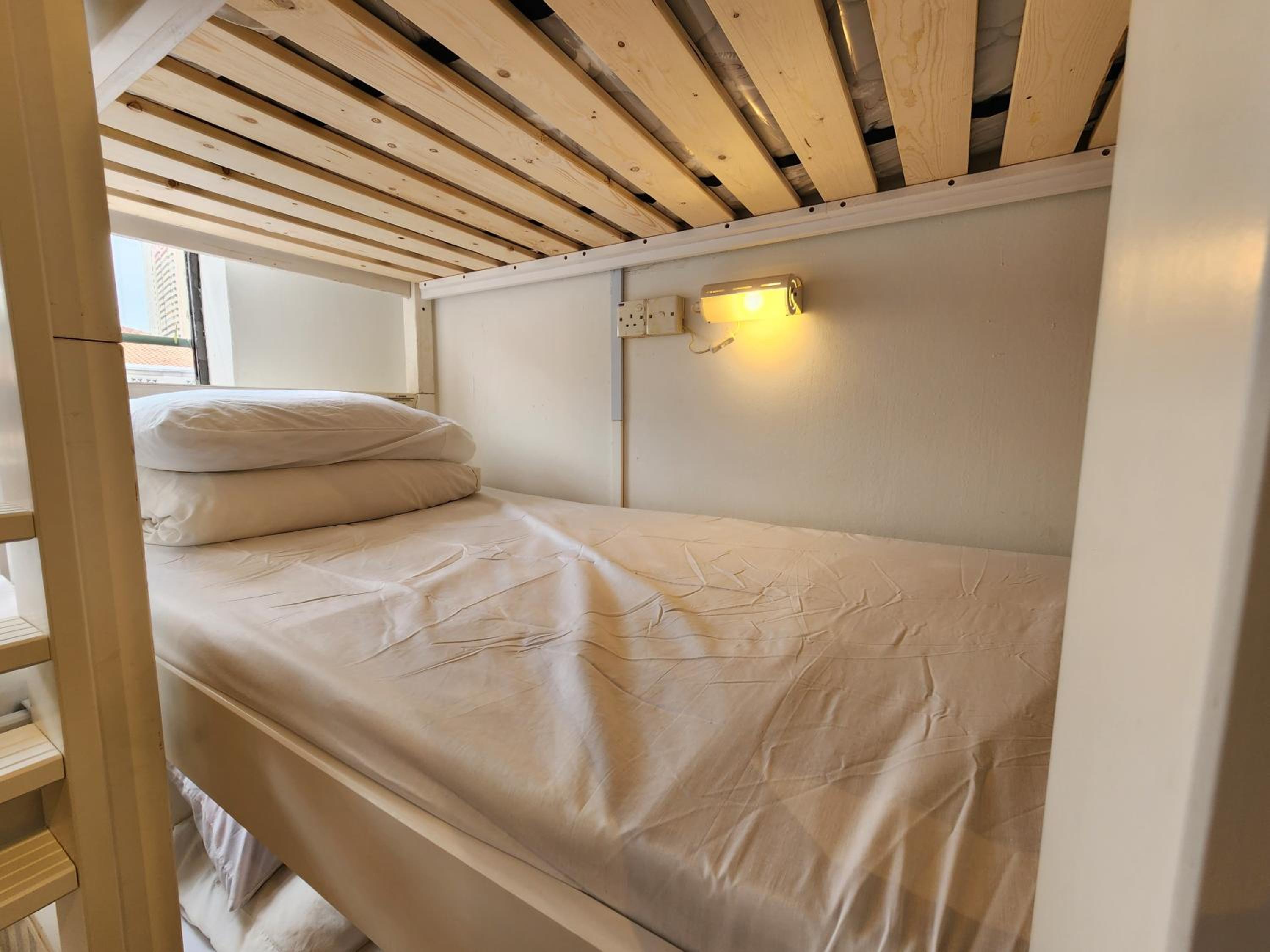 Bed in Triple-Deck 12-Bed Mixed Dorm photo 3