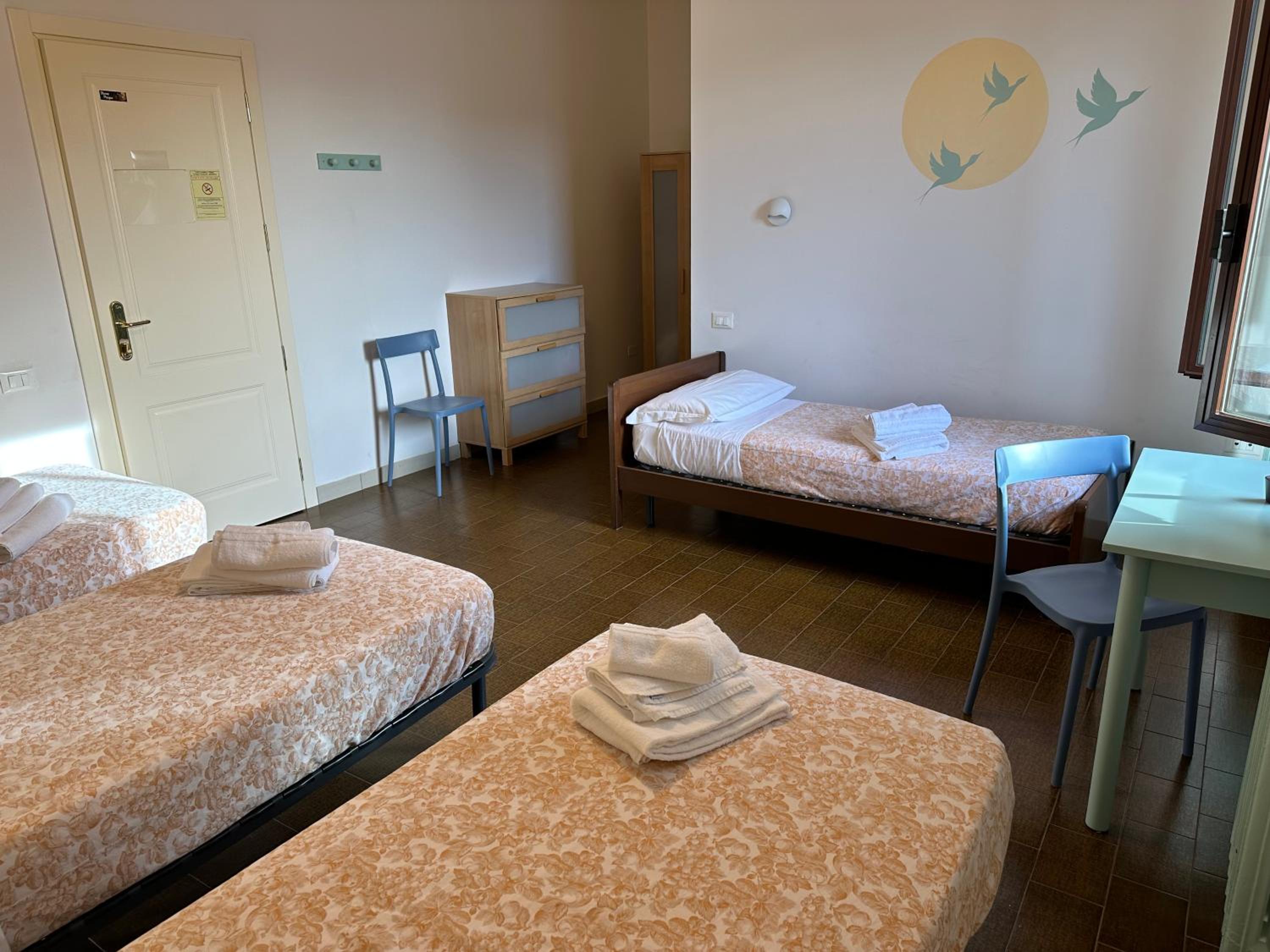 Quadruple Room with Private Bathroom