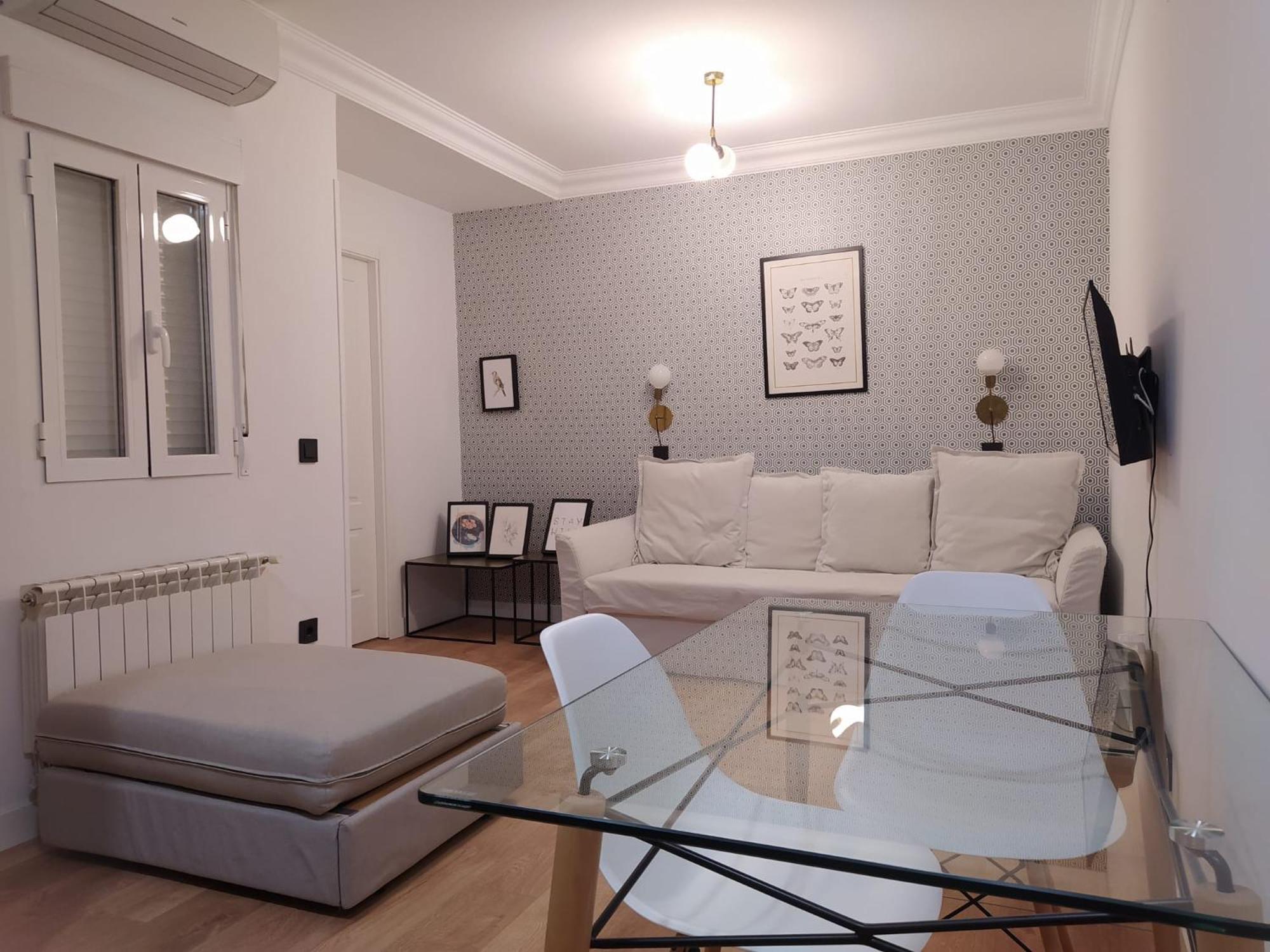 Estudio con sofá cama
