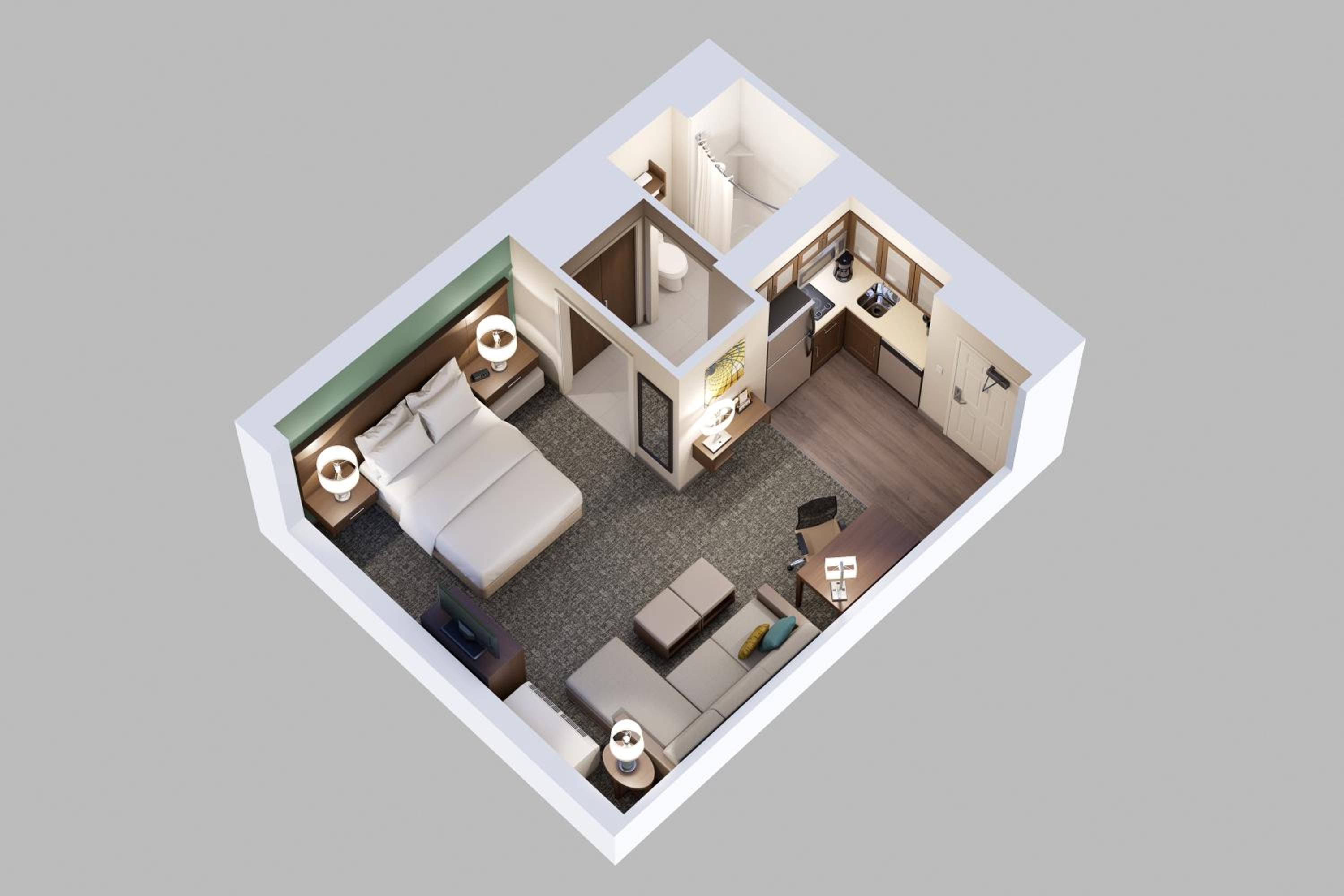 top down view of a small bedroom and living area