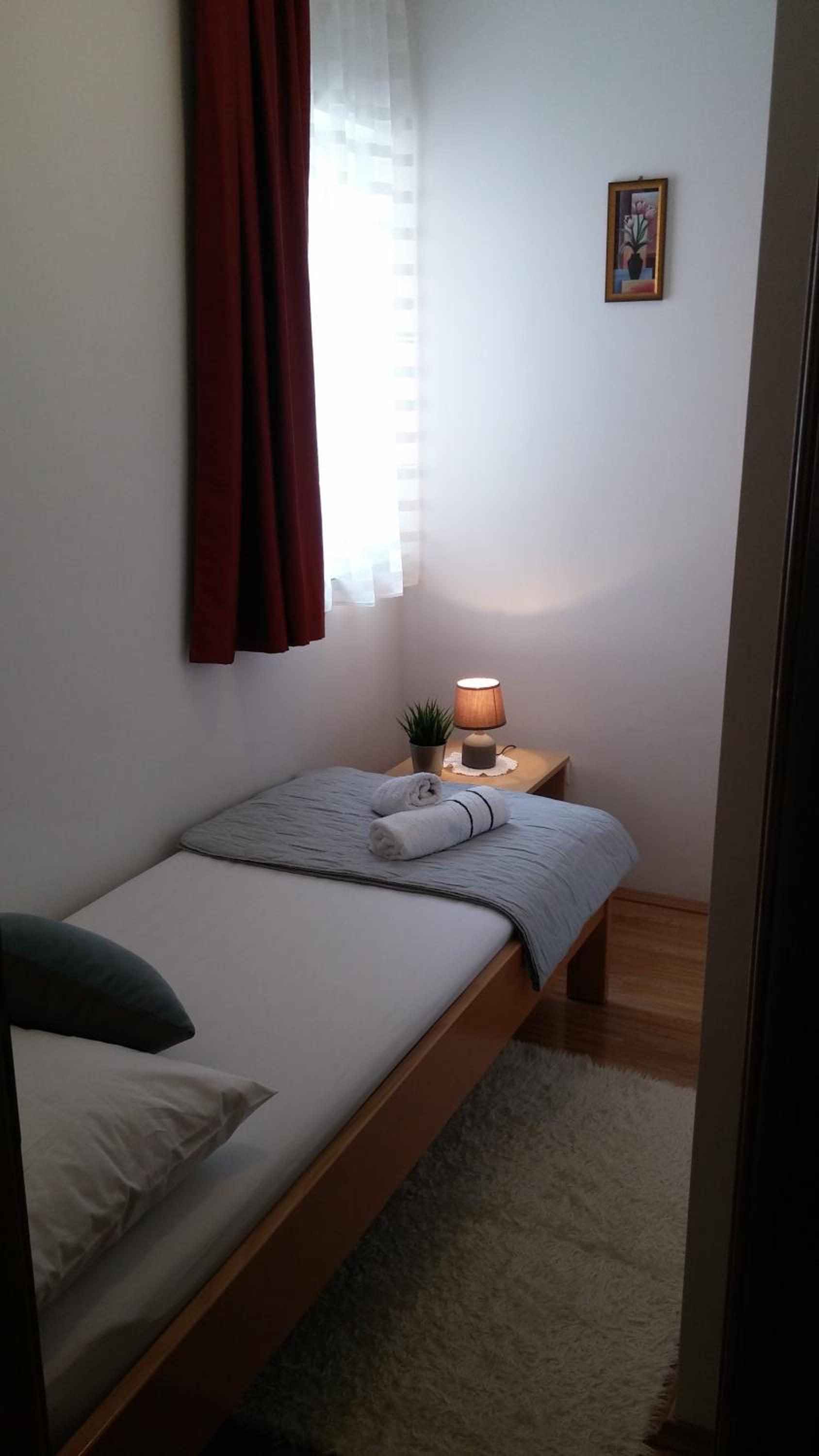 Two-Bedroom Apartment with Balcony and Garden View