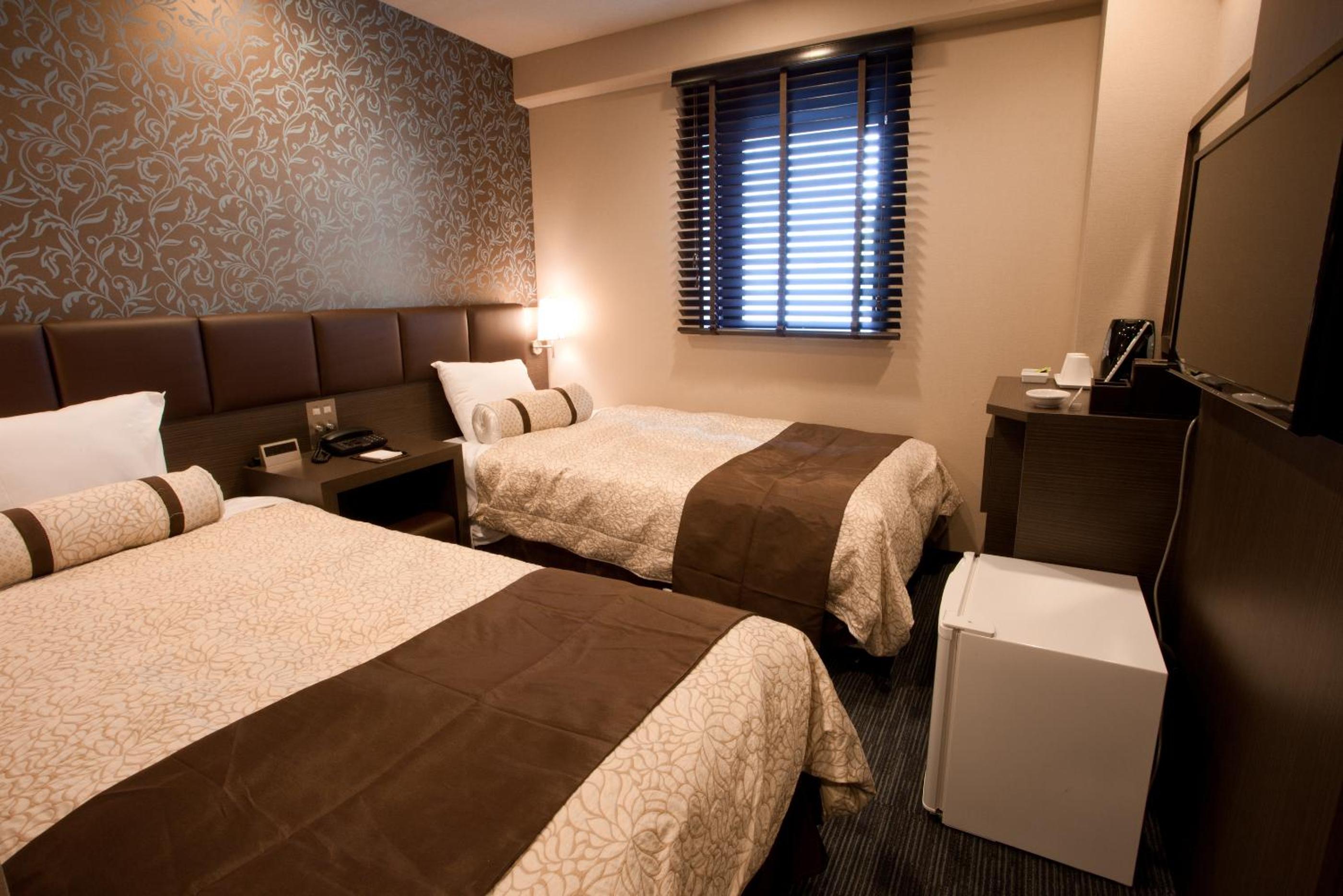 Twin Room (1 Adult) - Non-Smoking photo 2