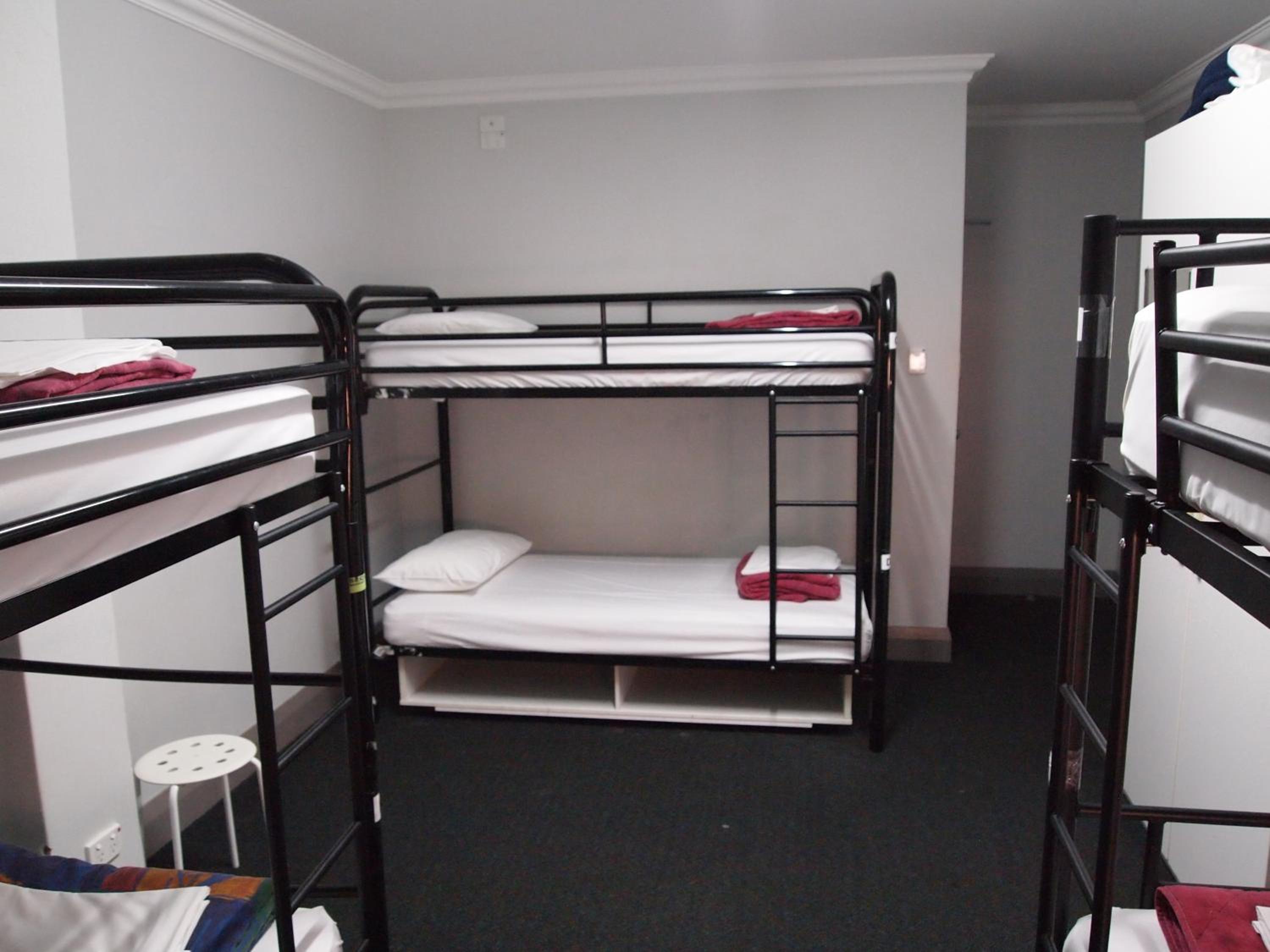 Bed in 4-Bed Dormitory Room with Shared Bathroom