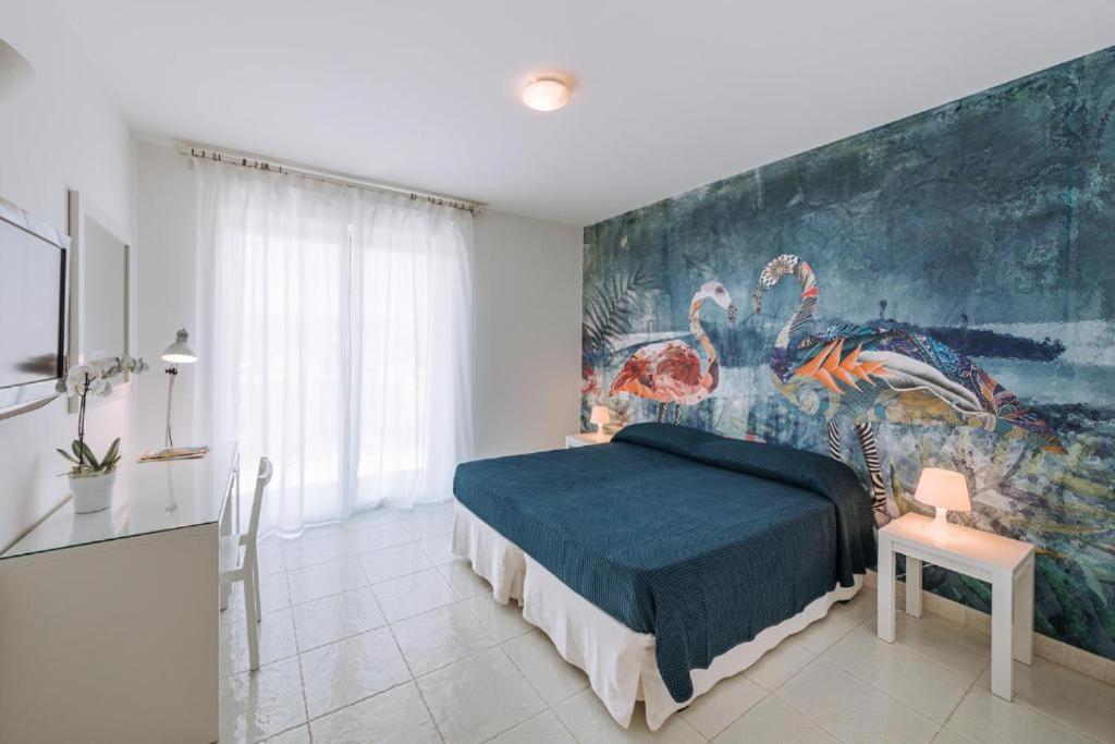 Quadruple Room with Balcony - Photo 8