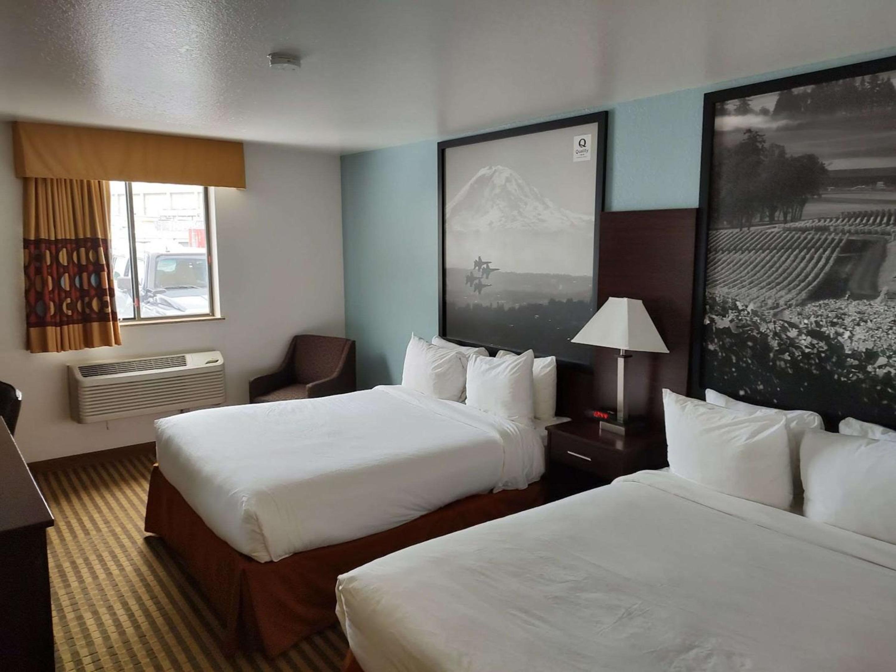 Queen Suite with Three Queen Beds - Non Smoking  - Photo 1