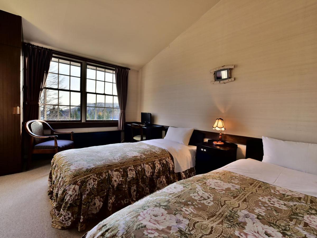 Twin Room with Private Bathroom - Photo 1