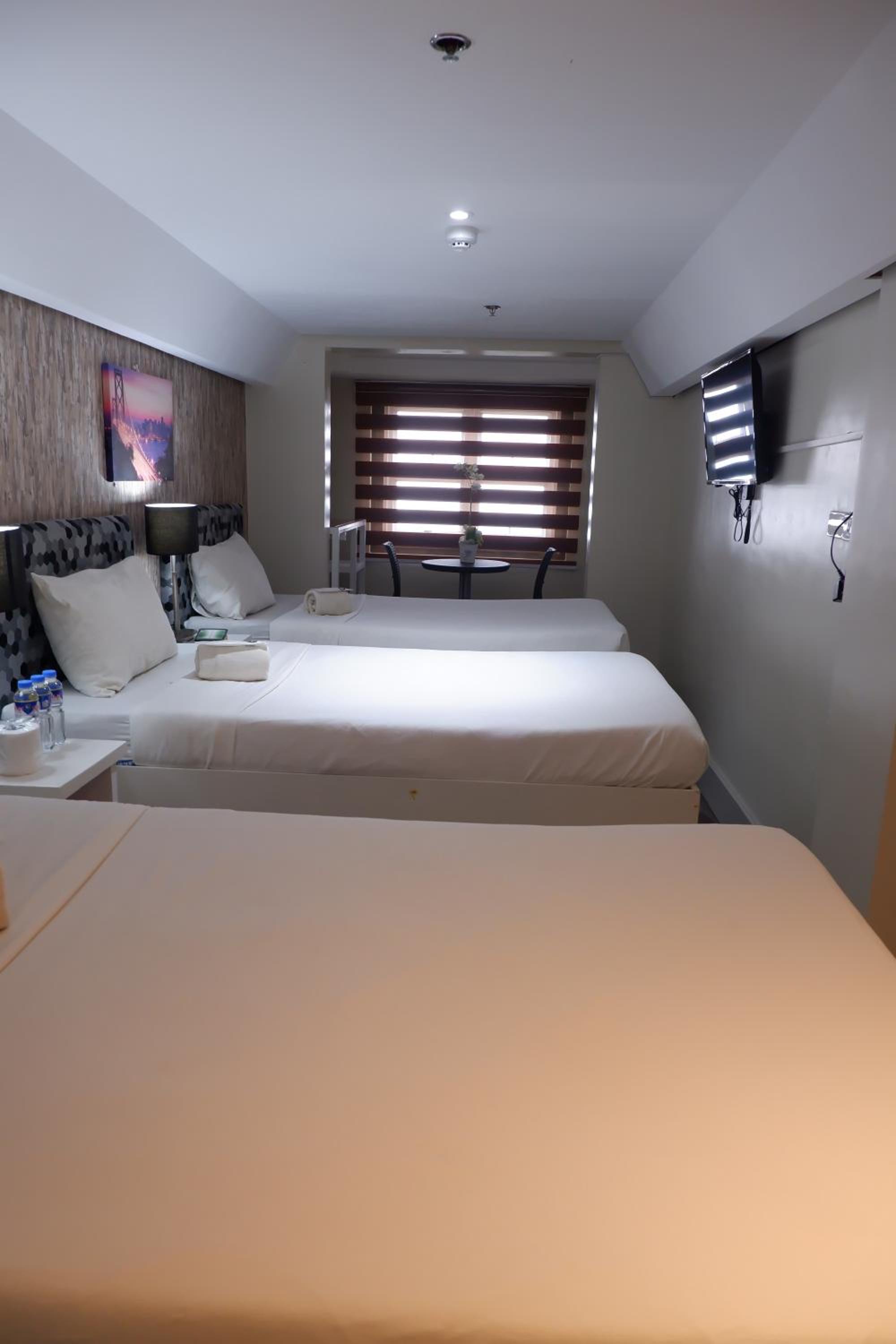 Triple Room - Photo 1