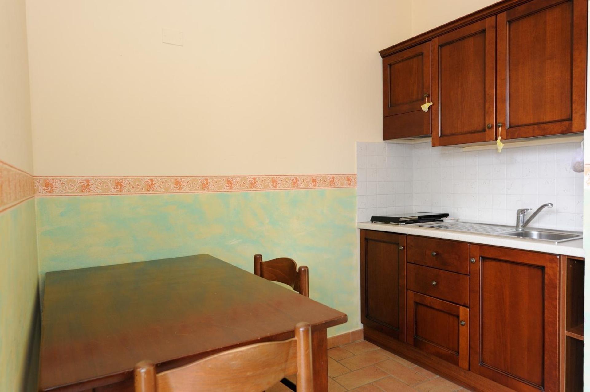 Two-Bedroom Apartment - Photo 24