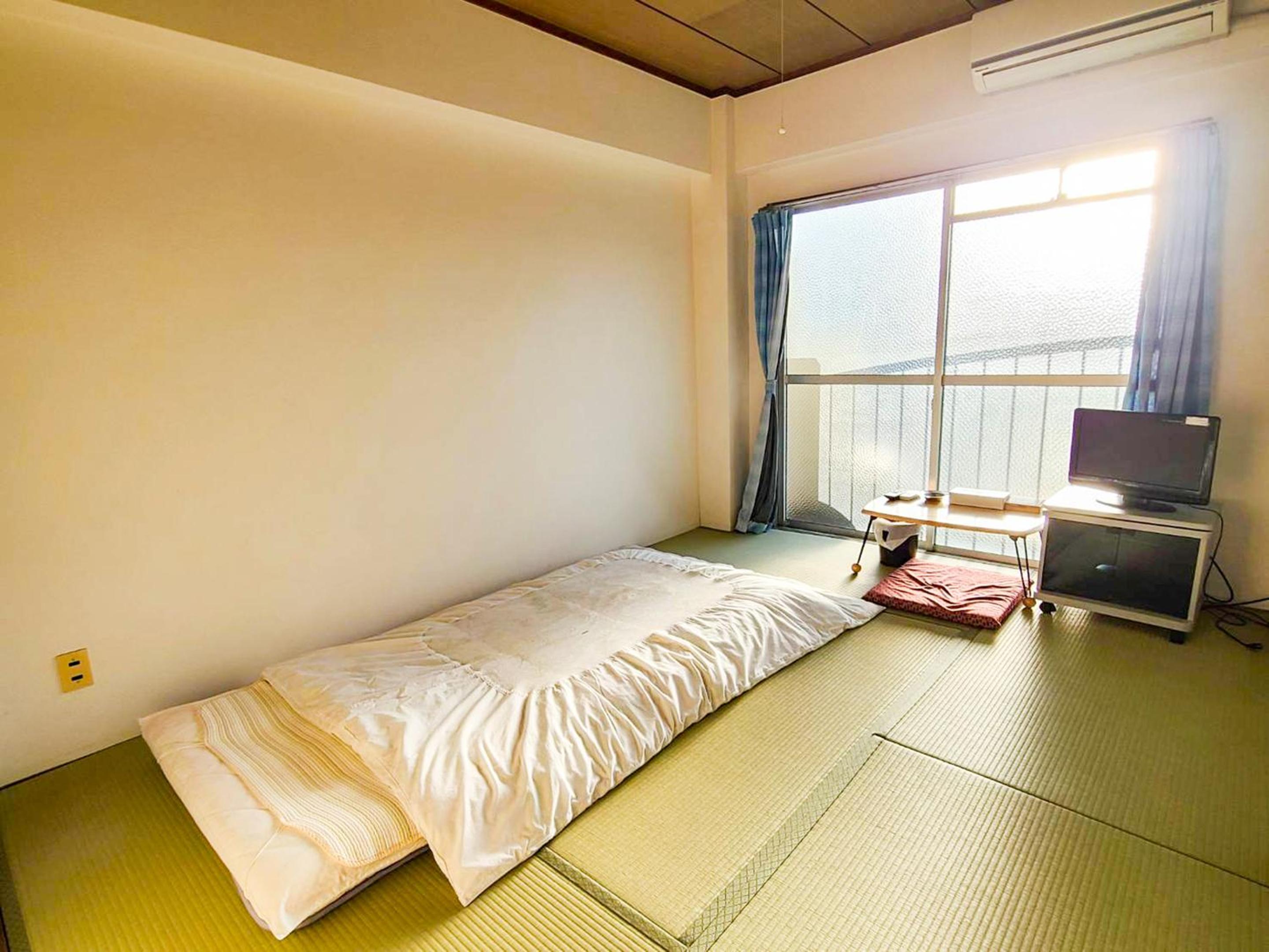 Japanese-Style Quadruple Room photo 3