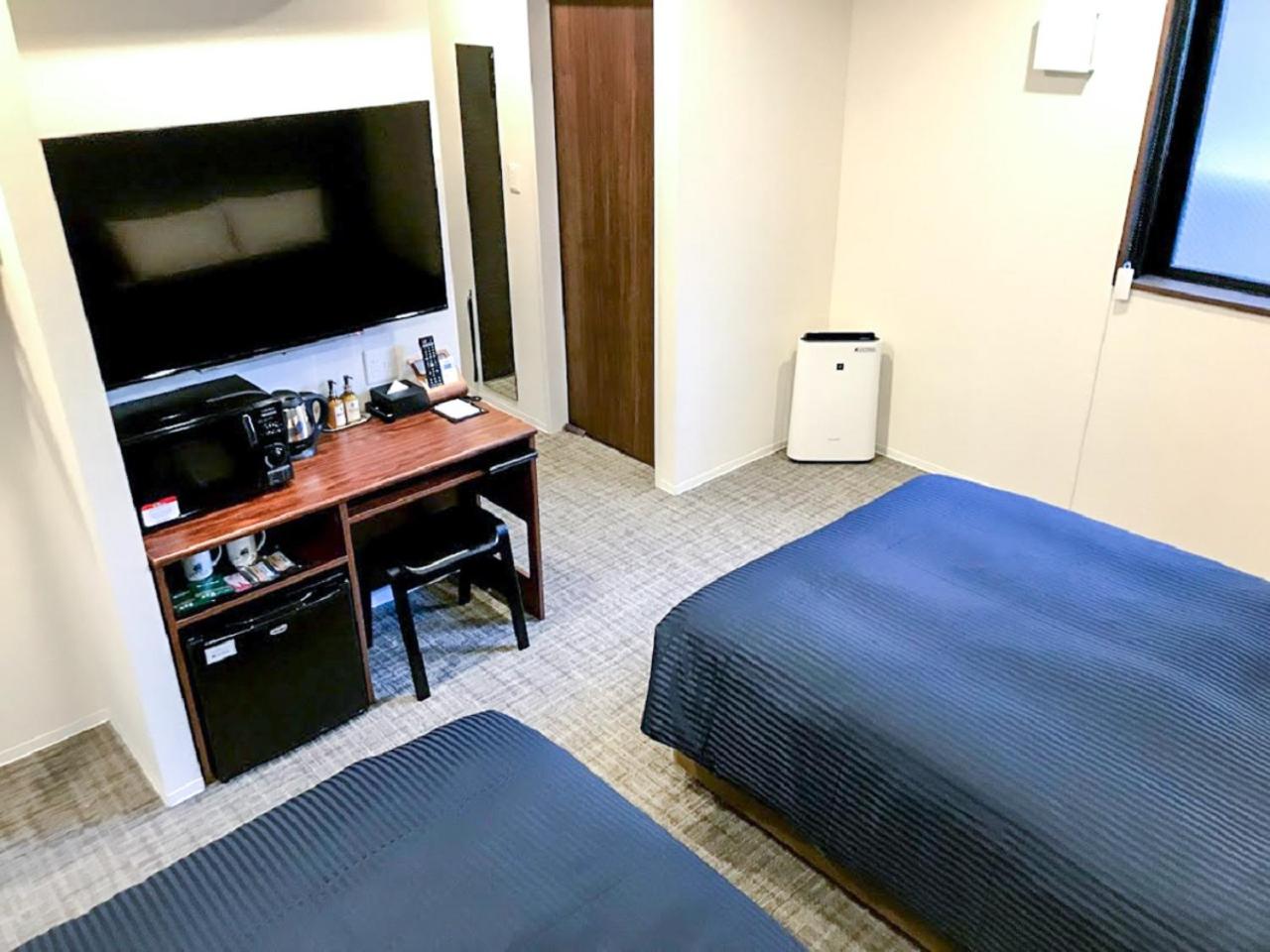 Twin Room - Non-Smoking - Photo 3