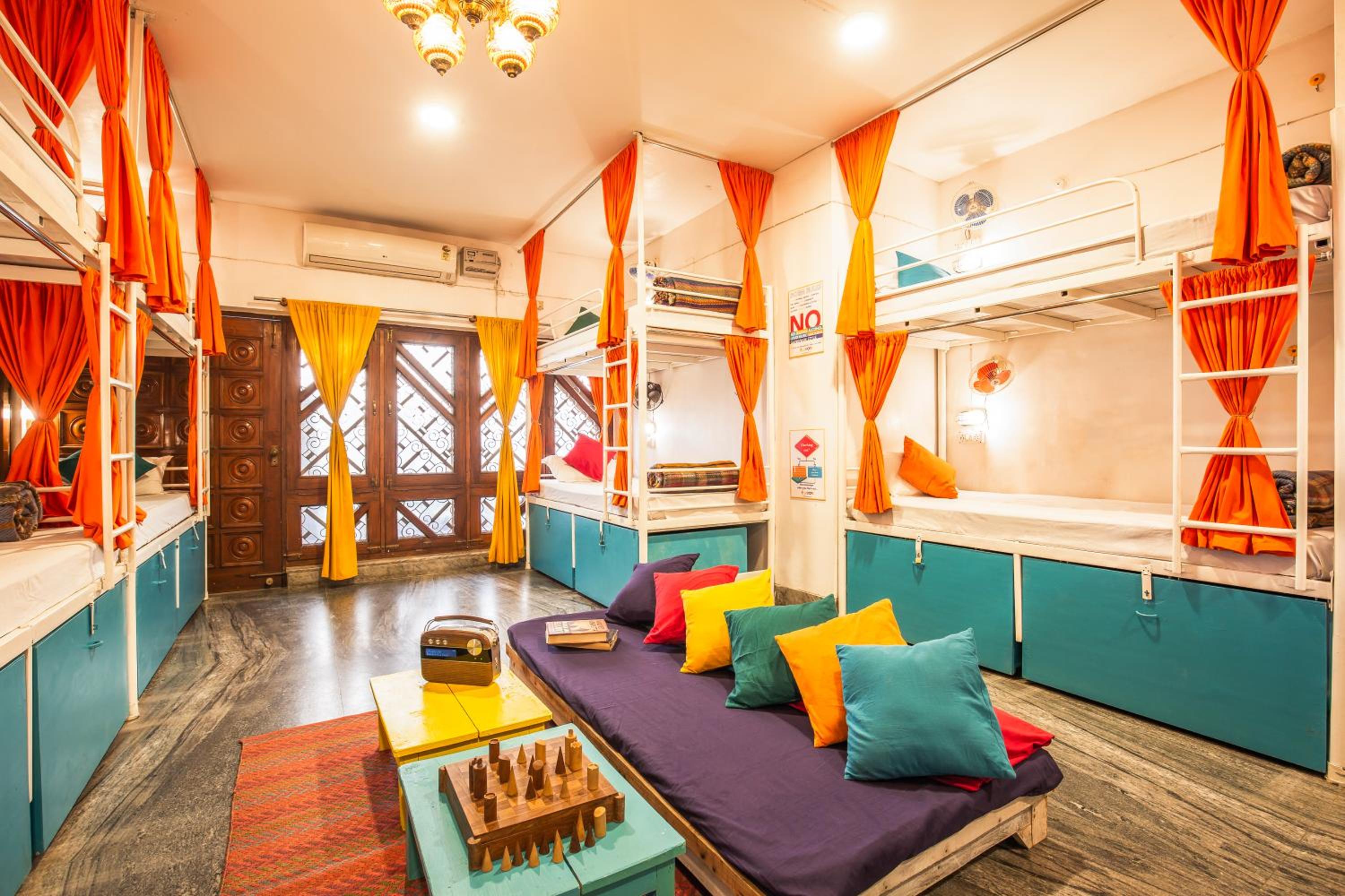 Bed in 14 Bed Mixed AC Dormitory Room with Shared Bathroom photo 1