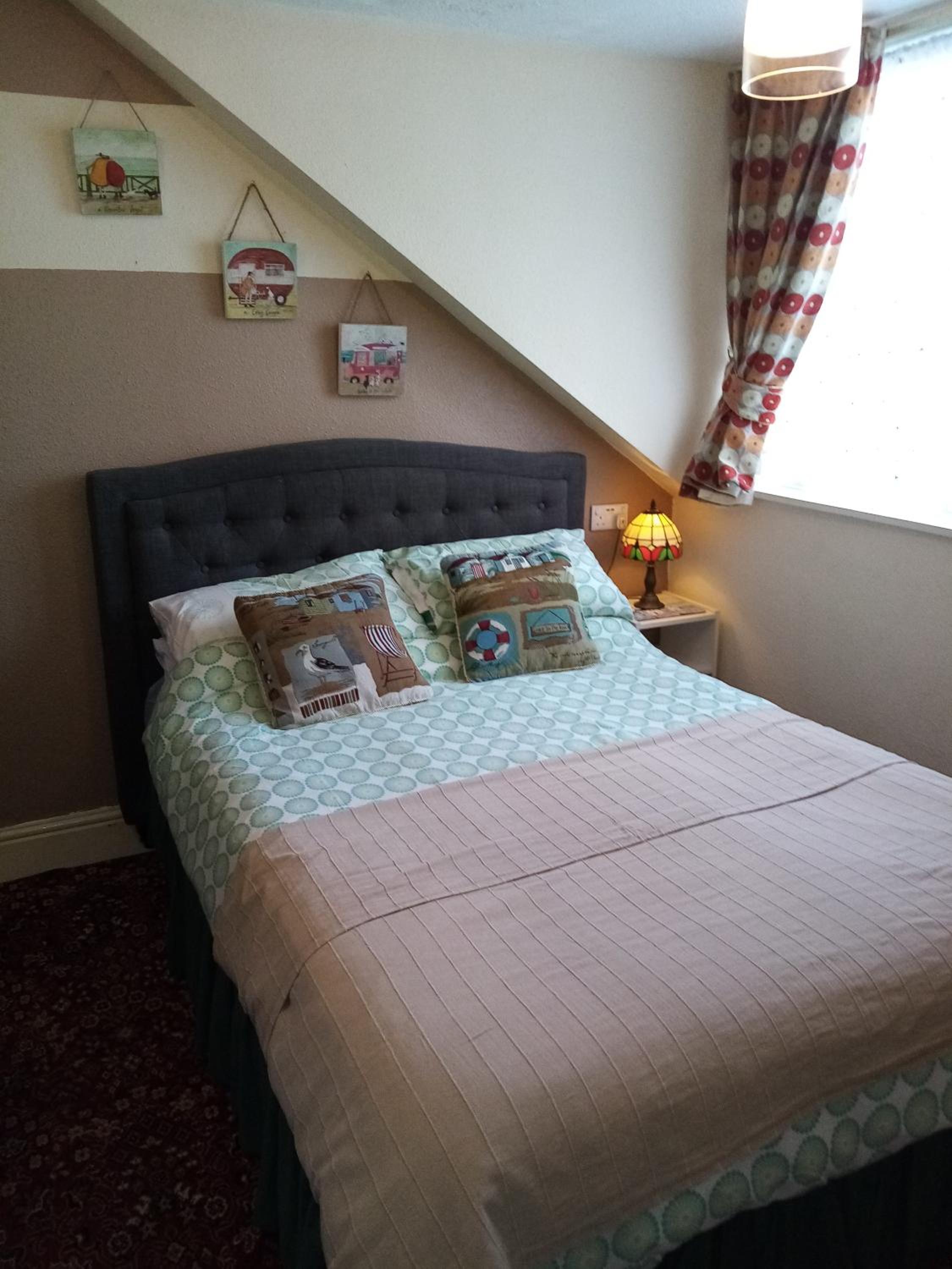 Basic Triple Room With Shared Bathroom