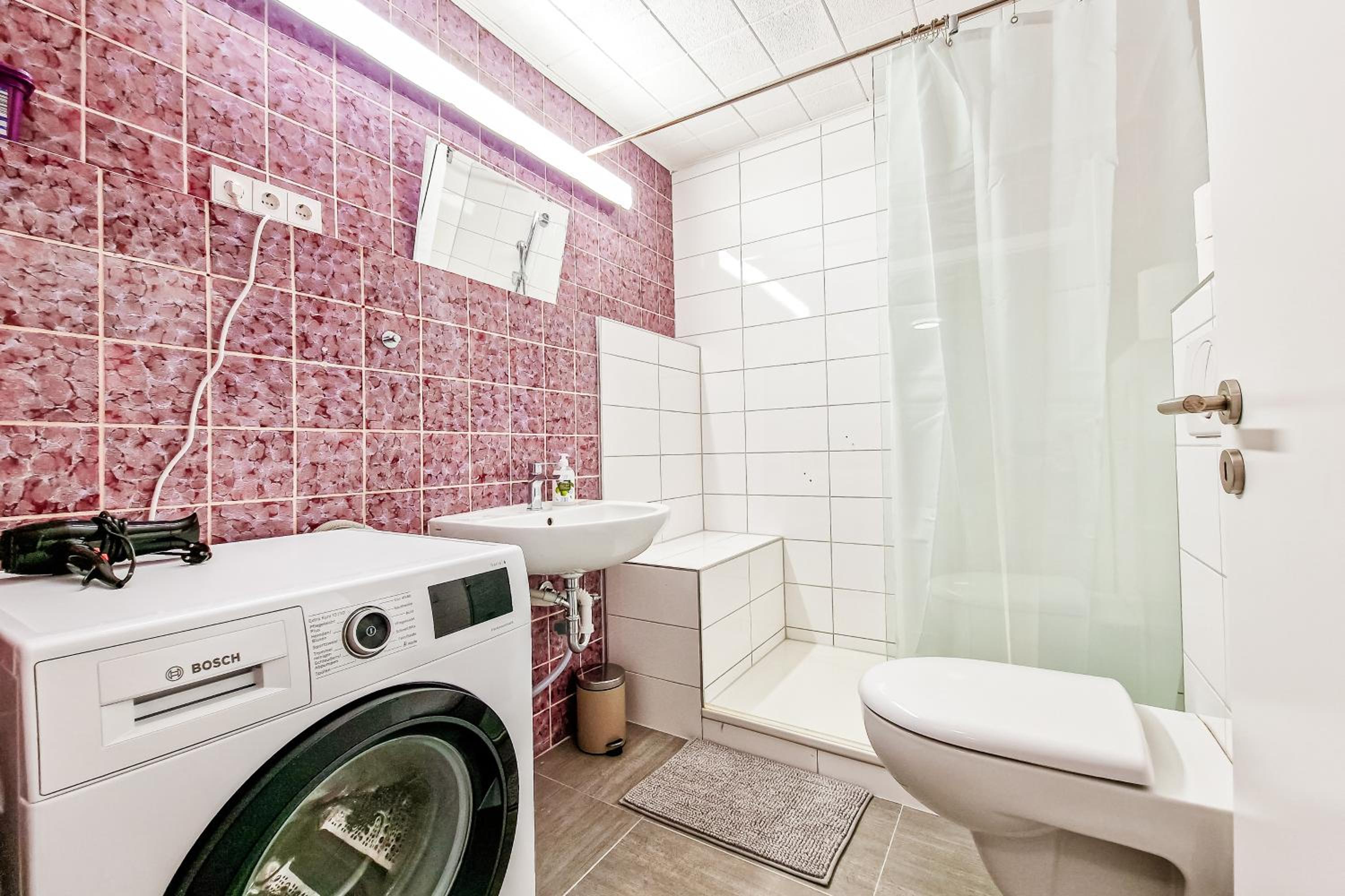 Three-Bedroom Apartment with Balcony photo 2