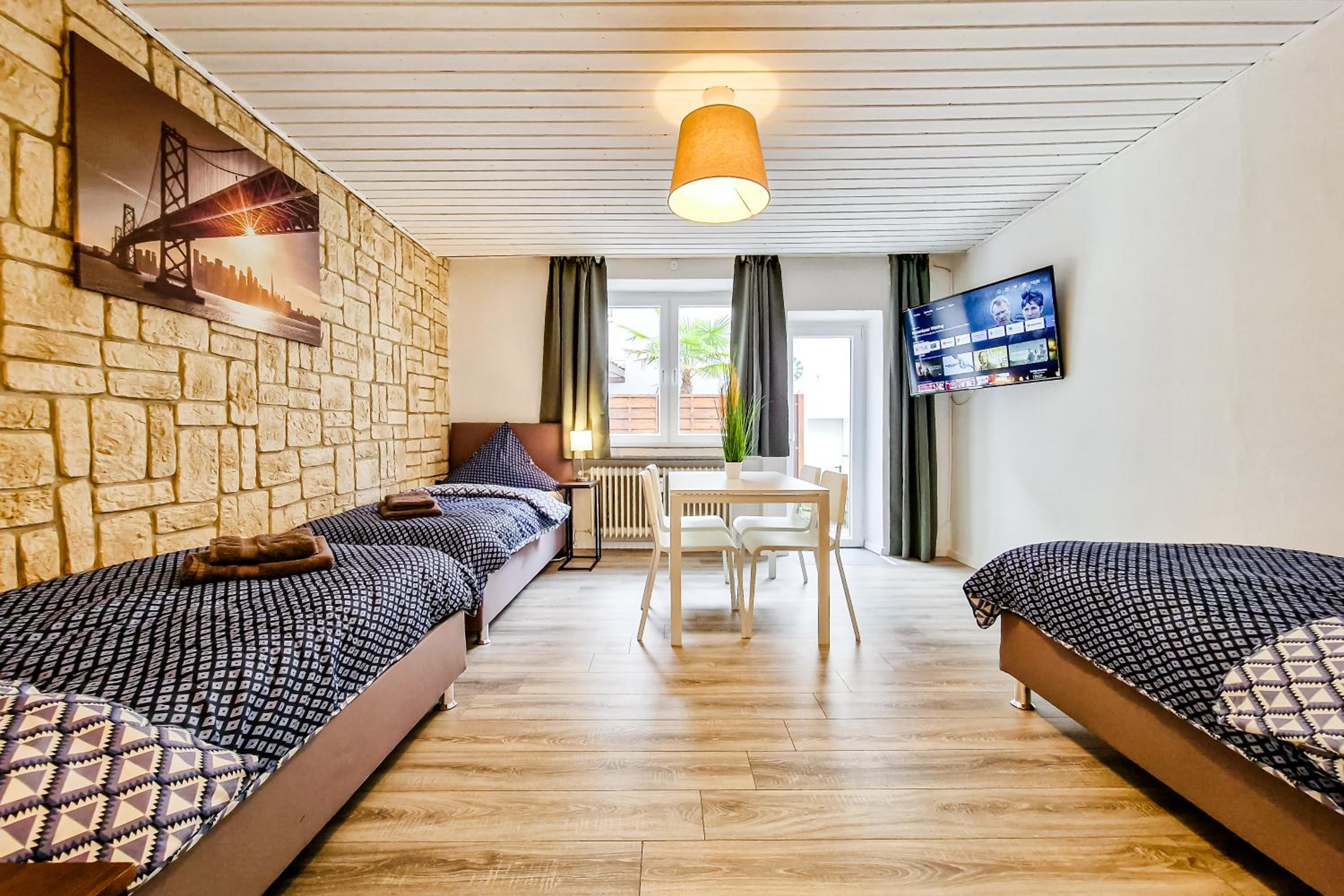 Three-Bedroom Apartment with Balcony photo 1