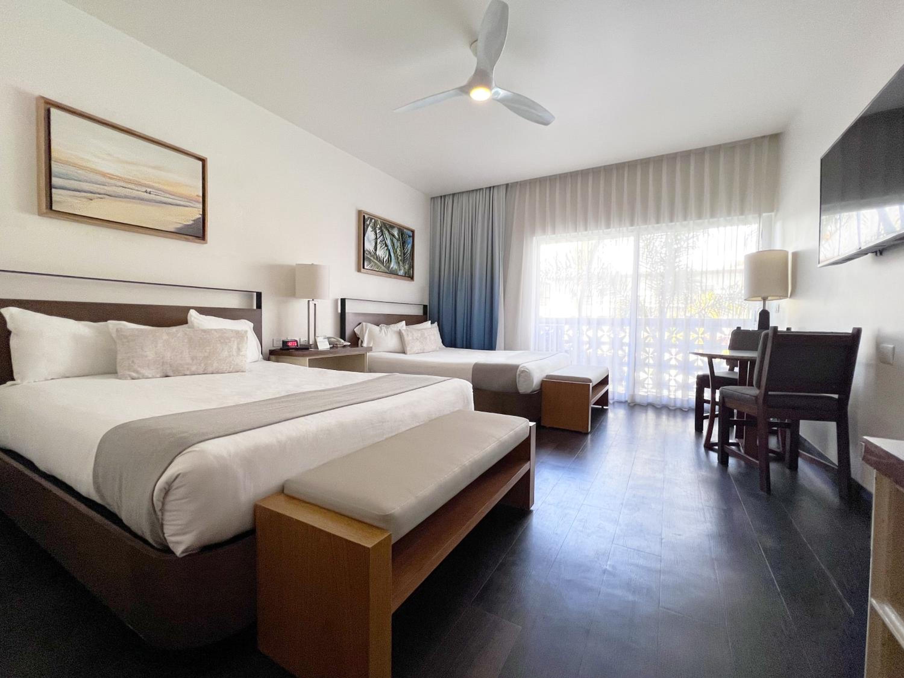 Deluxe Queen Room with Two Queen Beds - Photo 1