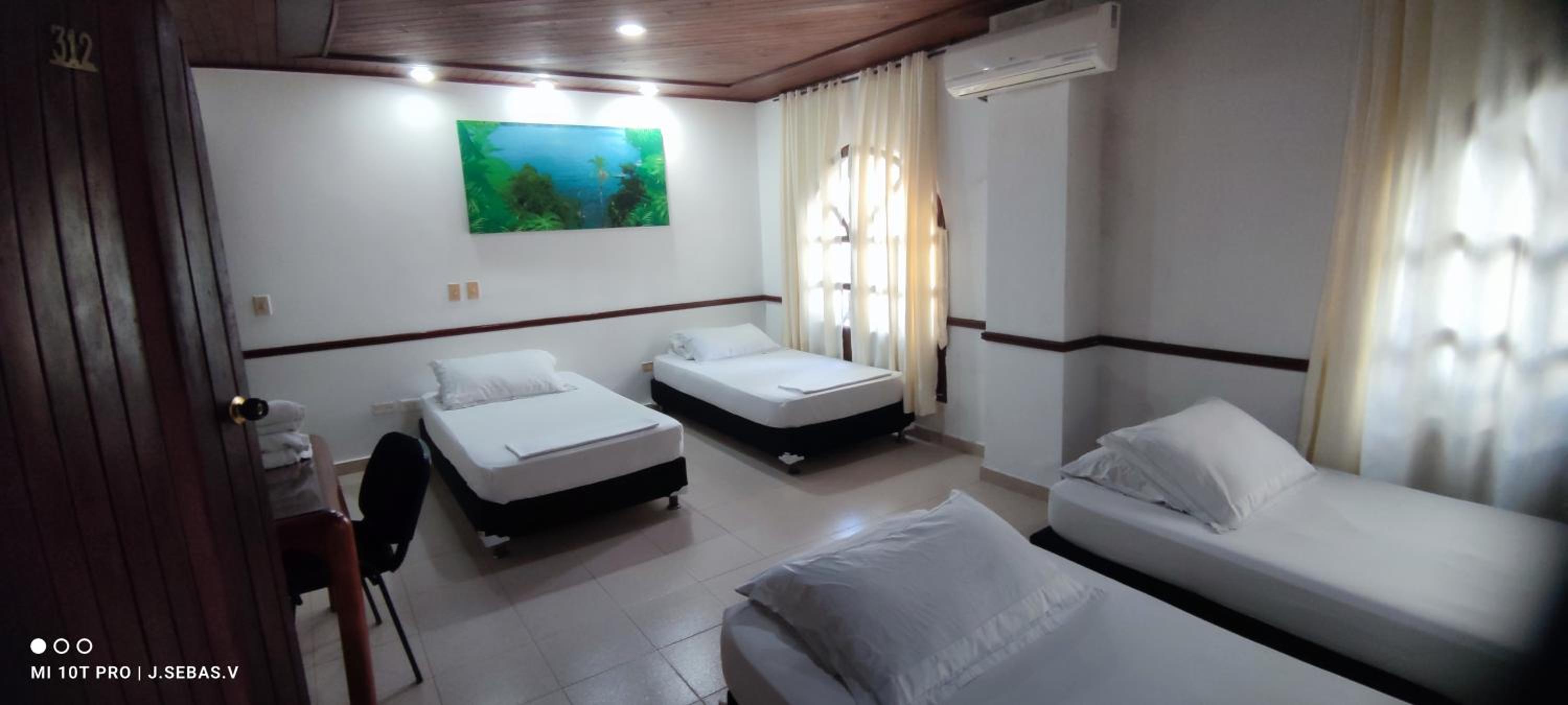Basic Triple Room photo 3