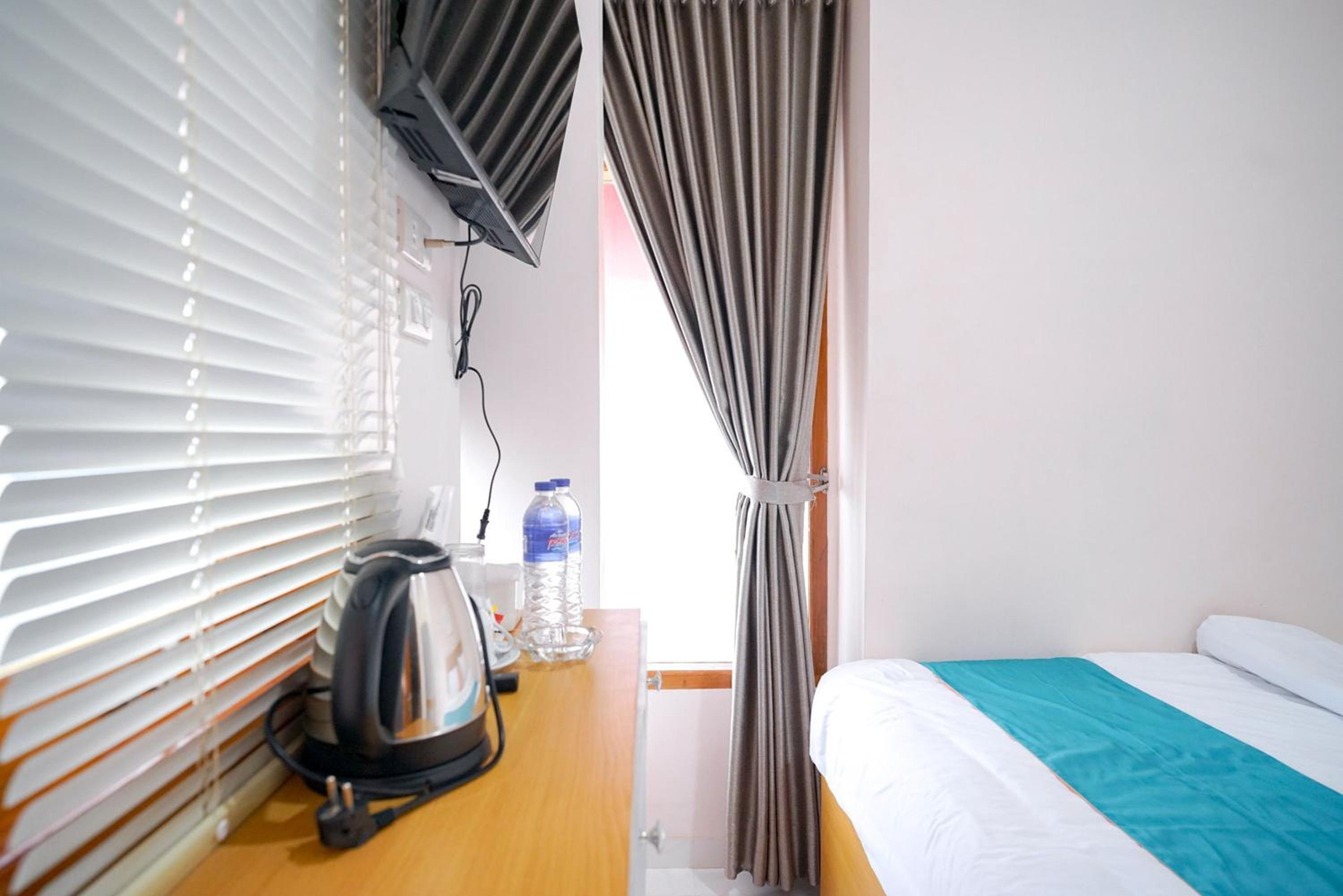 Deluxe Room - Photo 9