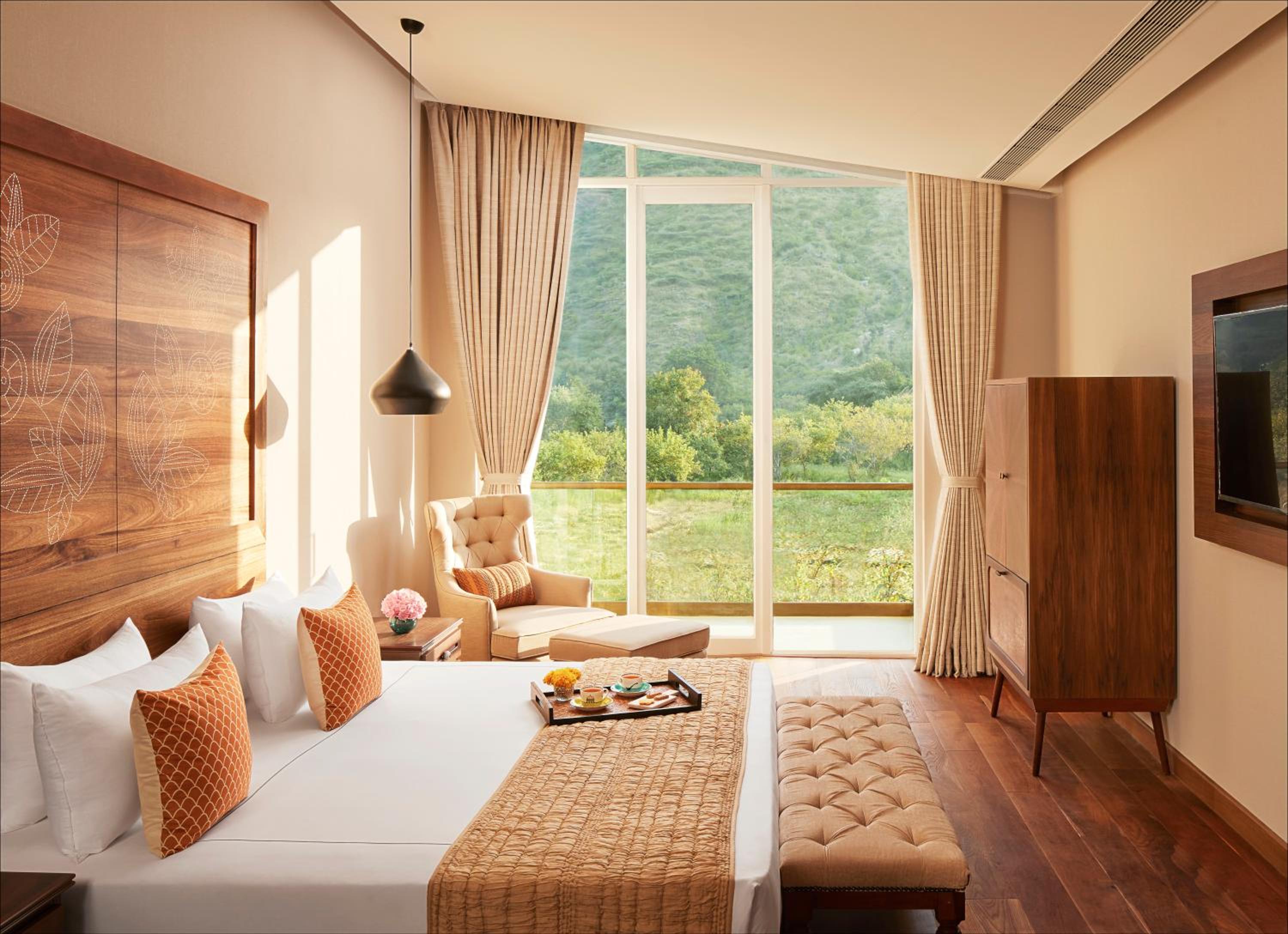 Deluxe Room With Garden And Sit-Out Double Bed - Photo 1