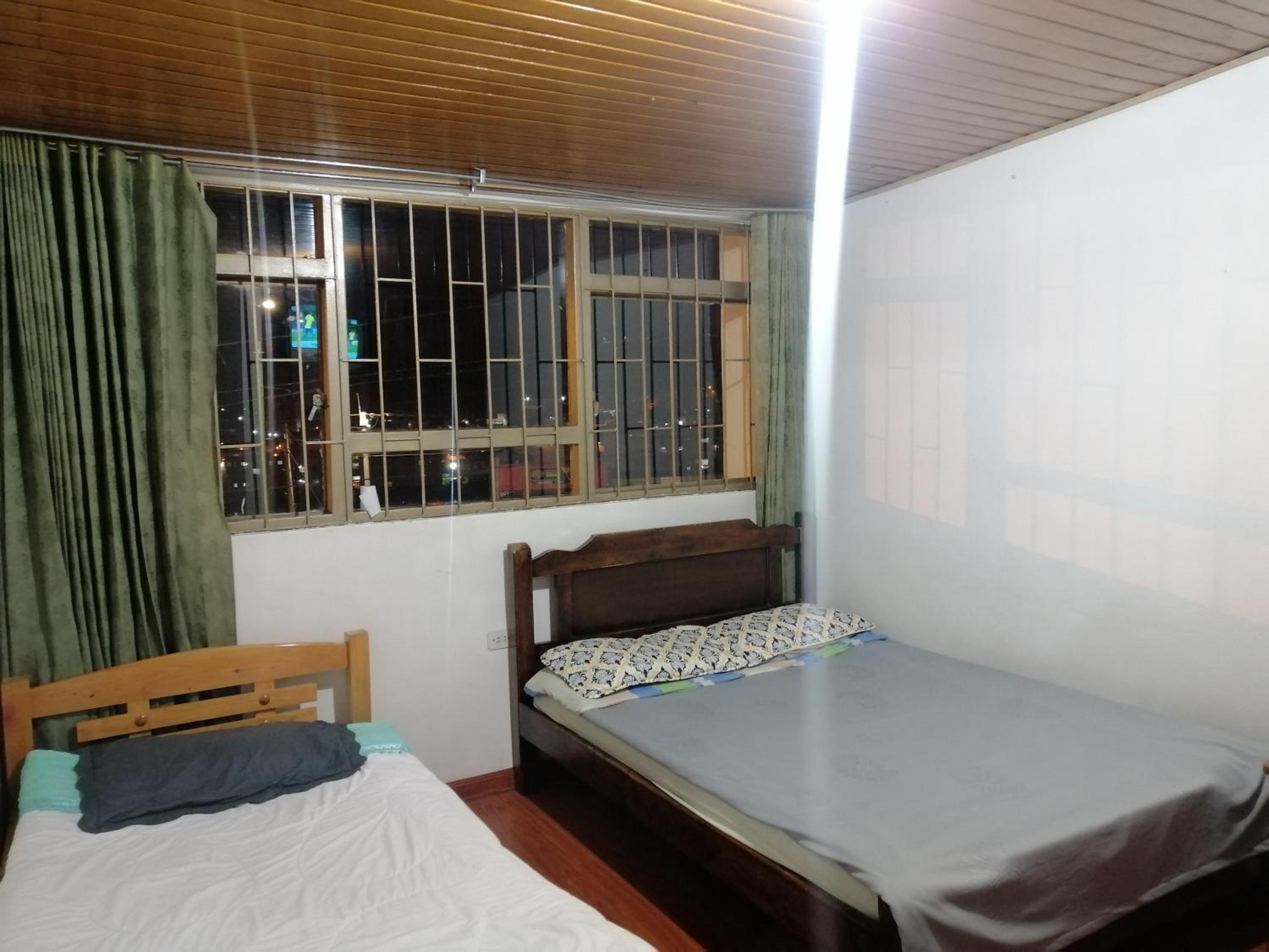 Basic Triple Room With Shared Bathroom photo 1
