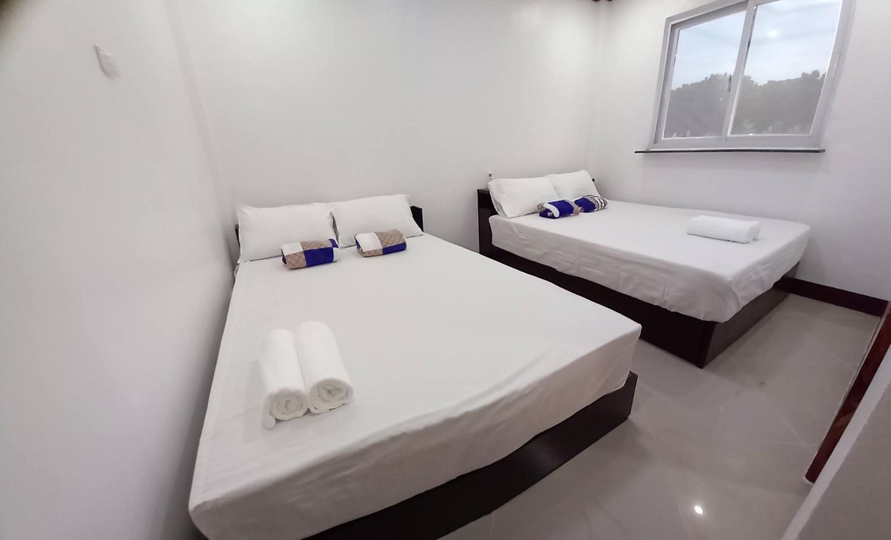Queen Room with Two Queen Beds - Photo 1