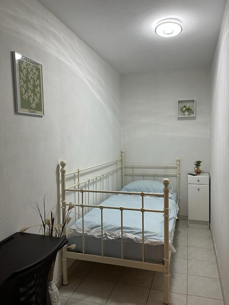 Three-Bedroom Apartment - Photo 45