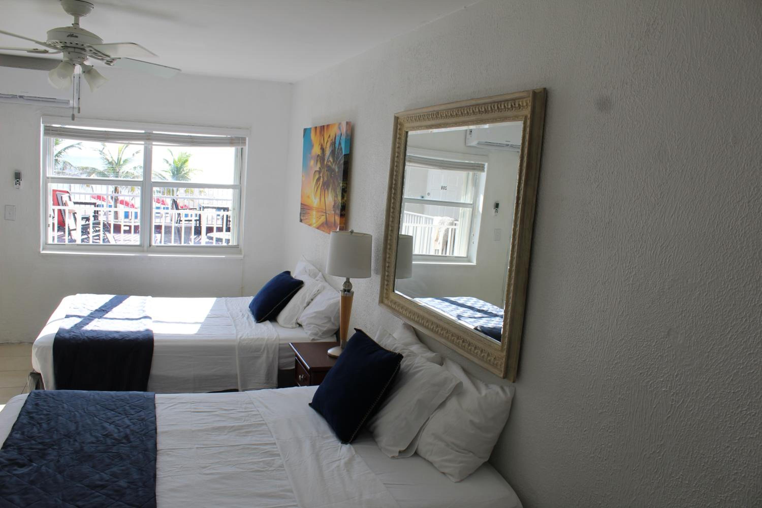 Deluxe Room with Two Queen Beds and Ocean View - Photo 1