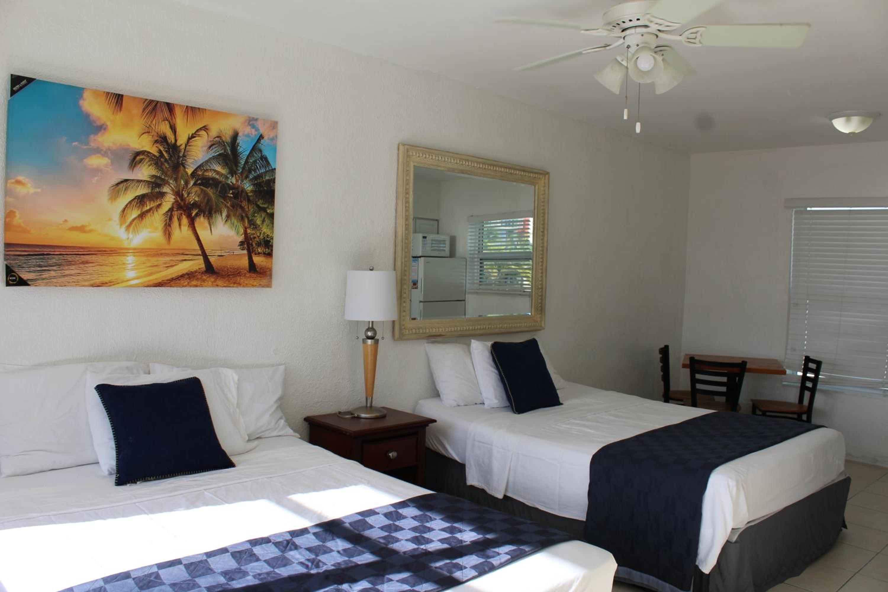 Queen Room with Two Queen Beds - Photo 1
