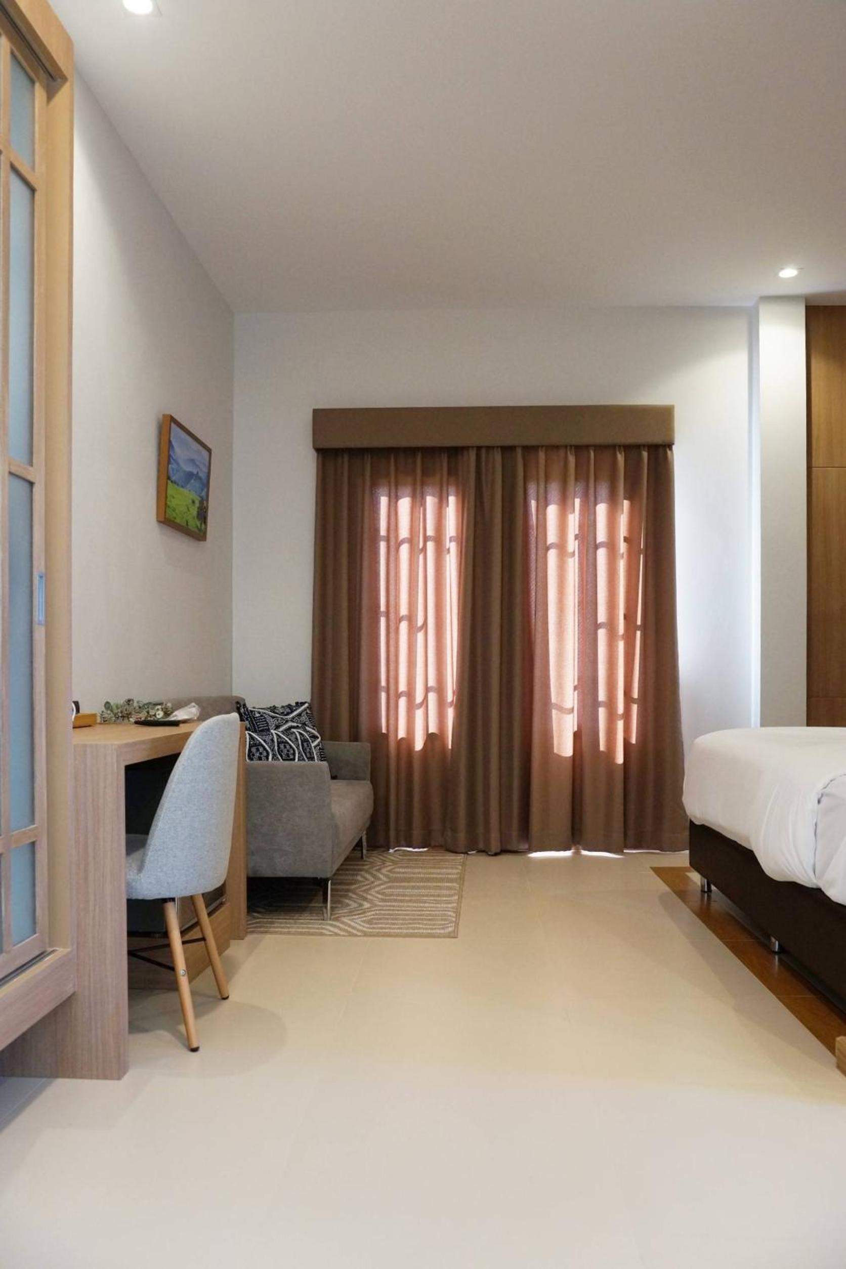 Deluxe Room - Photo 11