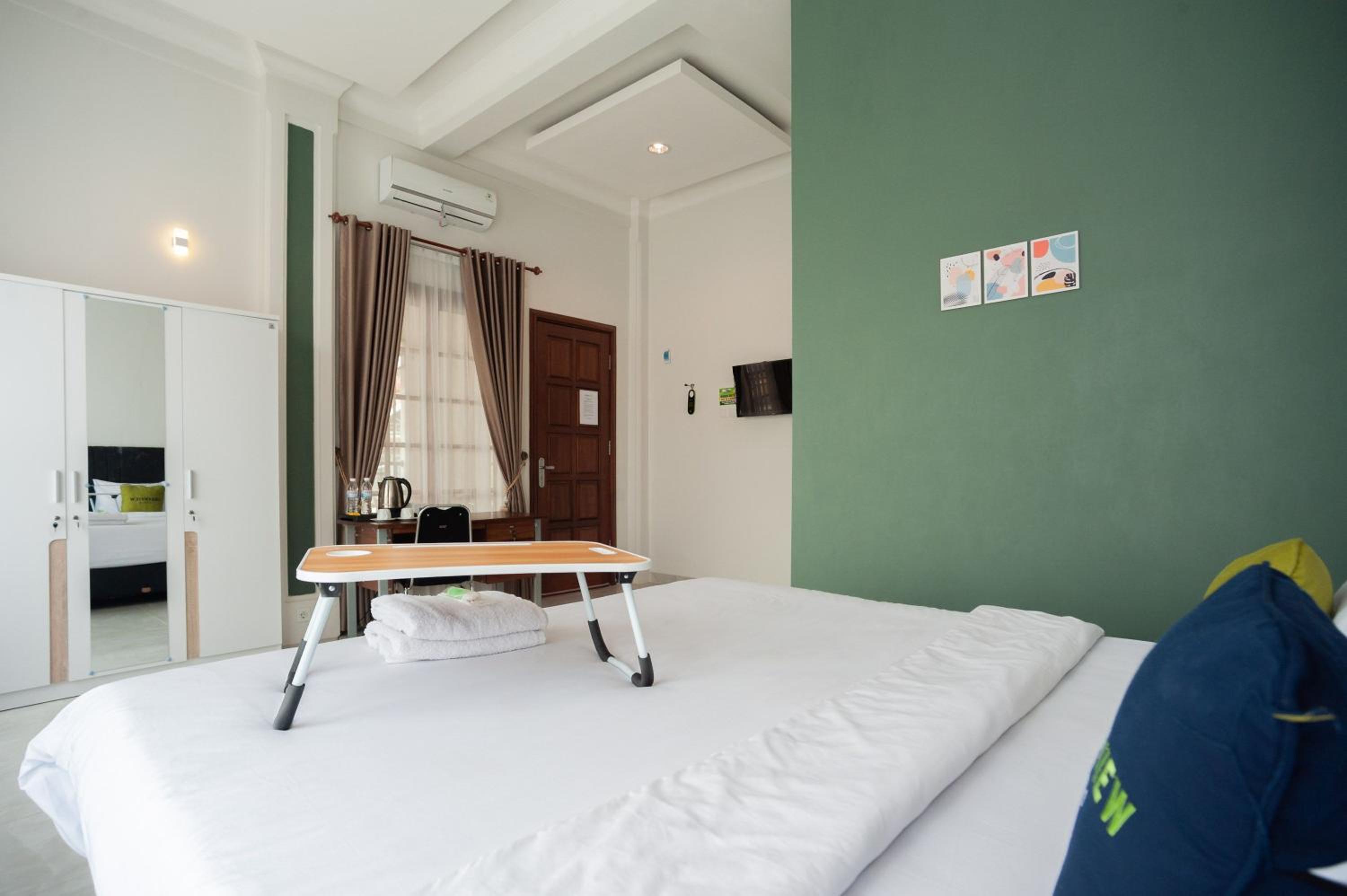 Deluxe Room - Photo 5
