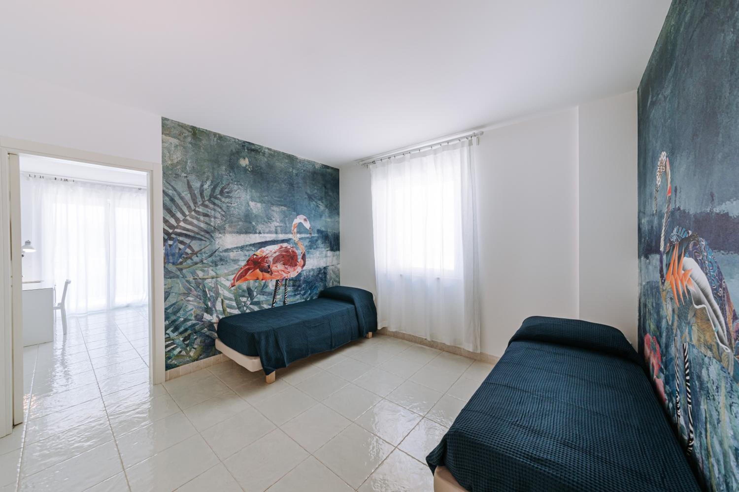 Quadruple Room with Balcony - Photo 10