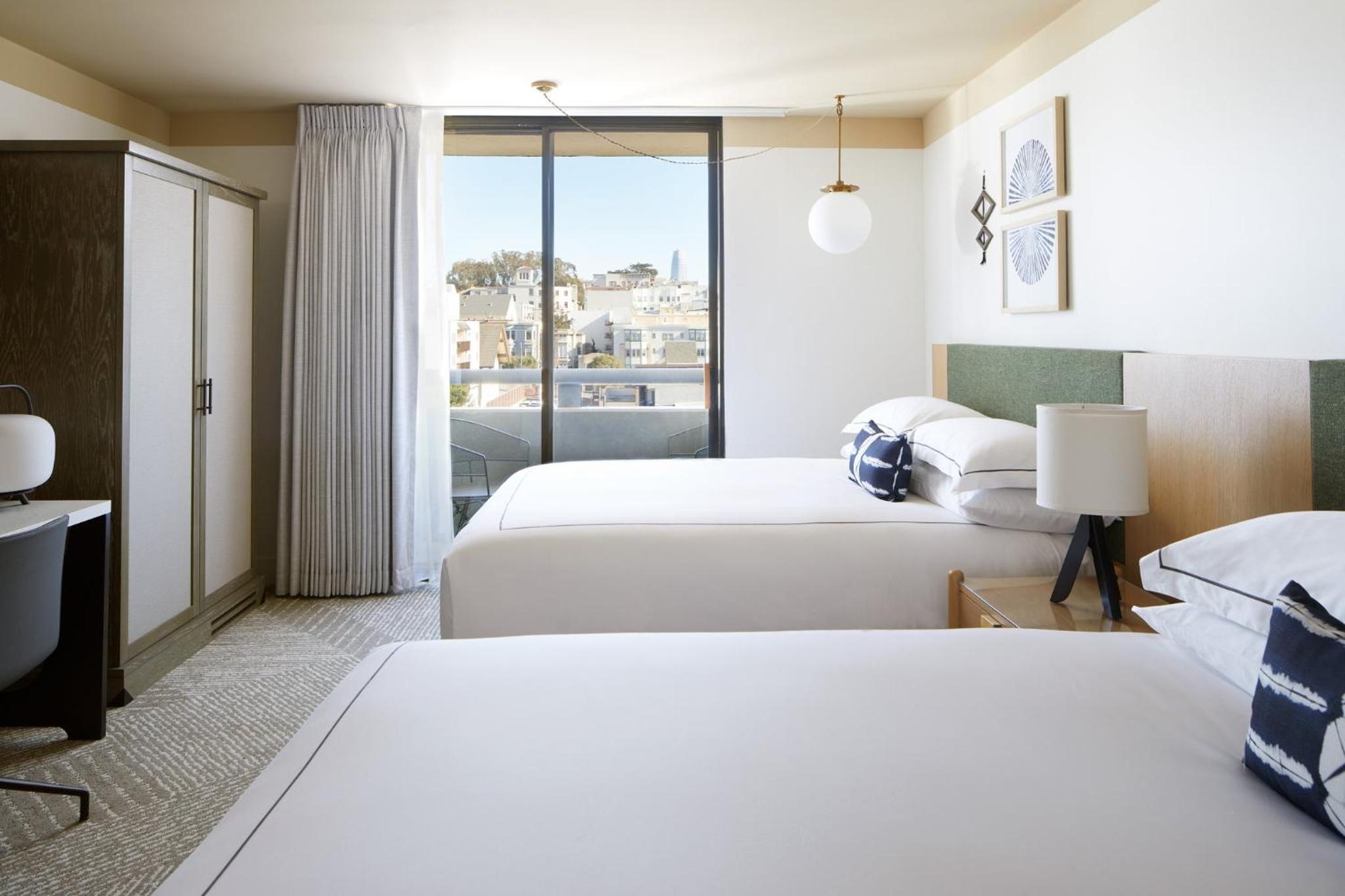 Essential Queen Room with Two Queen Beds and Balcony