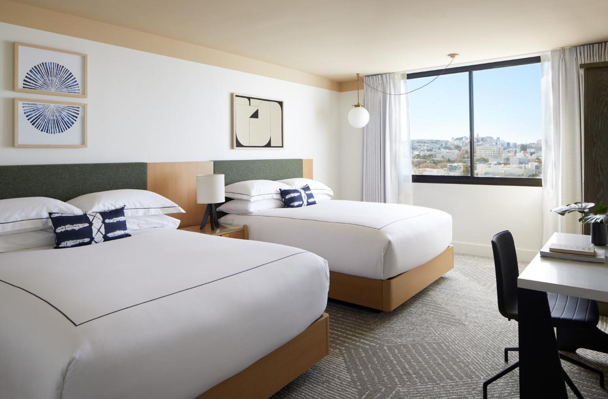 Essential Queen Room with Two Queen Beds and City View - Photo 1