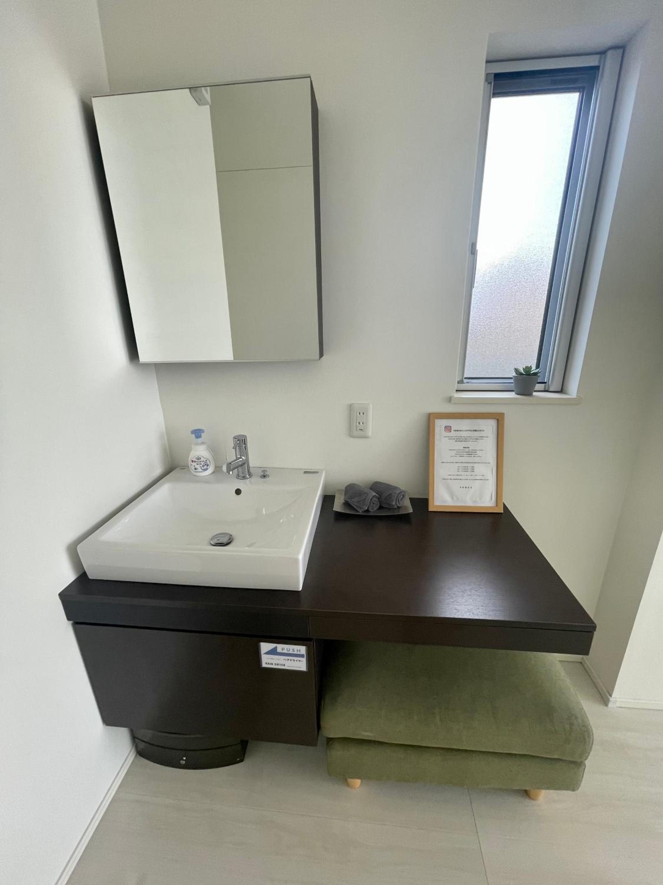 Three-Bedroom Apartment - Photo 15
