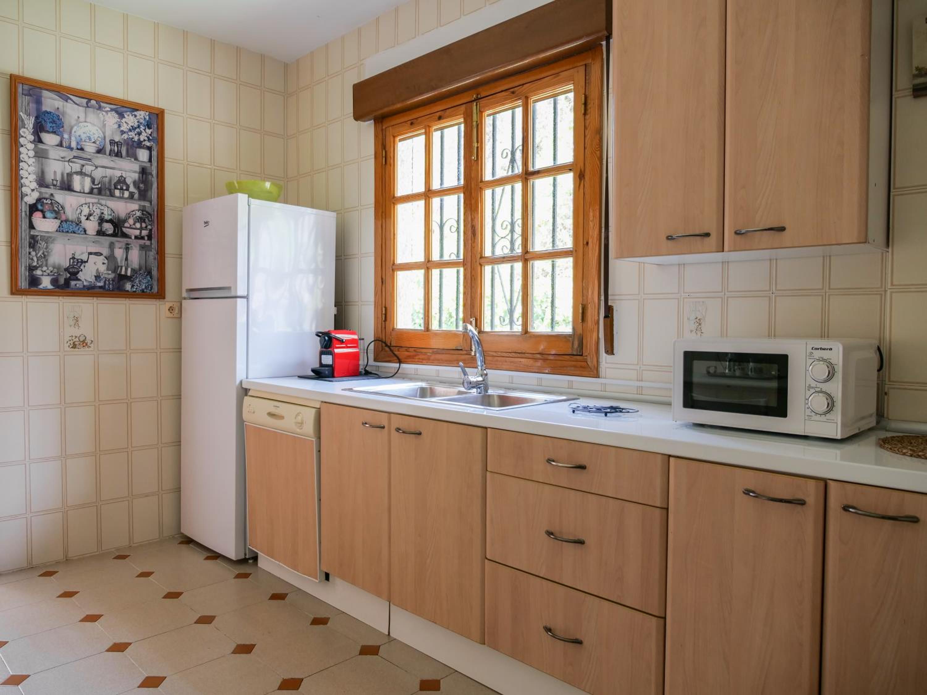 Four-Bedroom House - Photo 25
